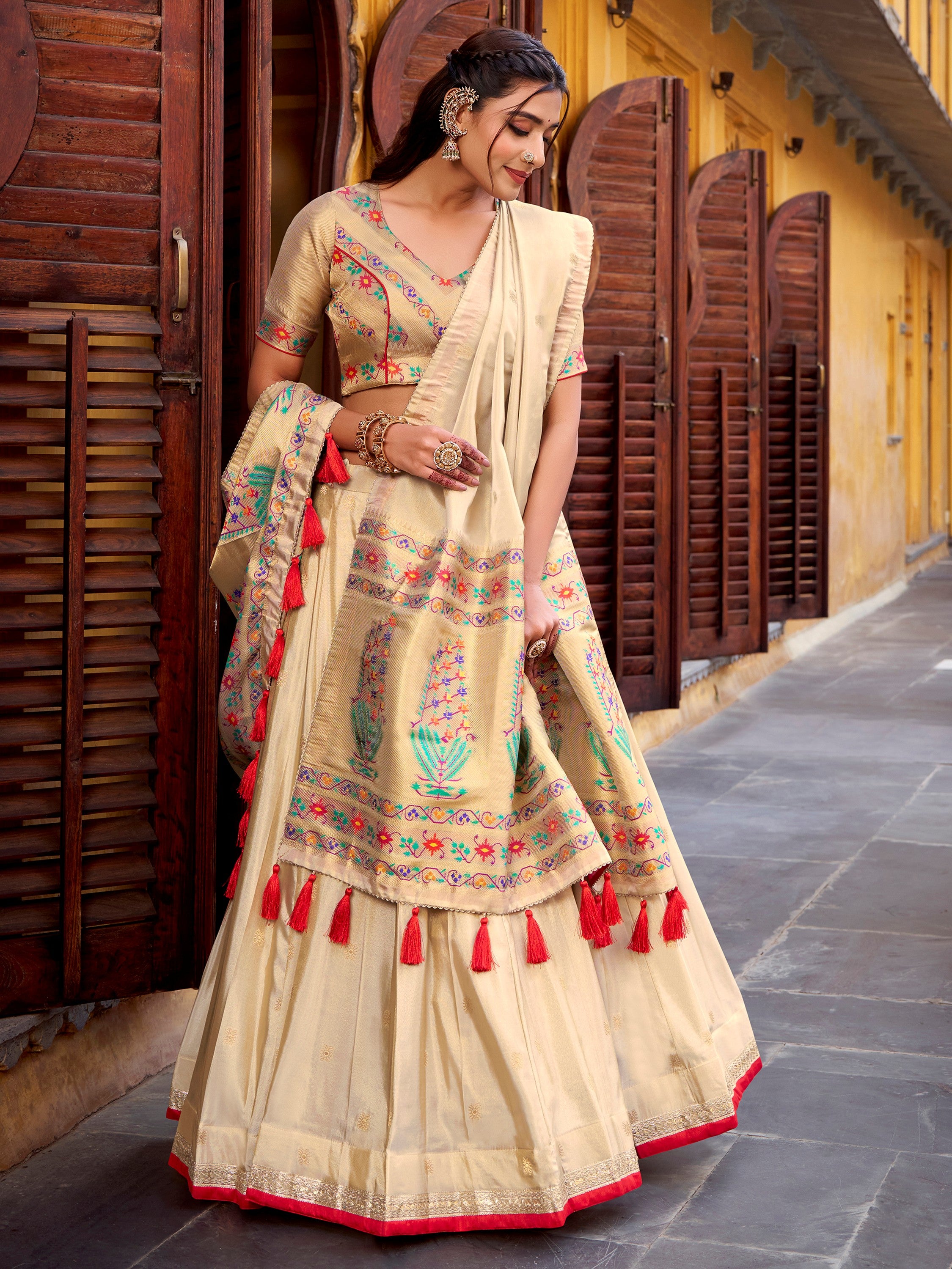 Glamorous Cream Zari Weaving Silk Marriage Wear Lehenga Choli