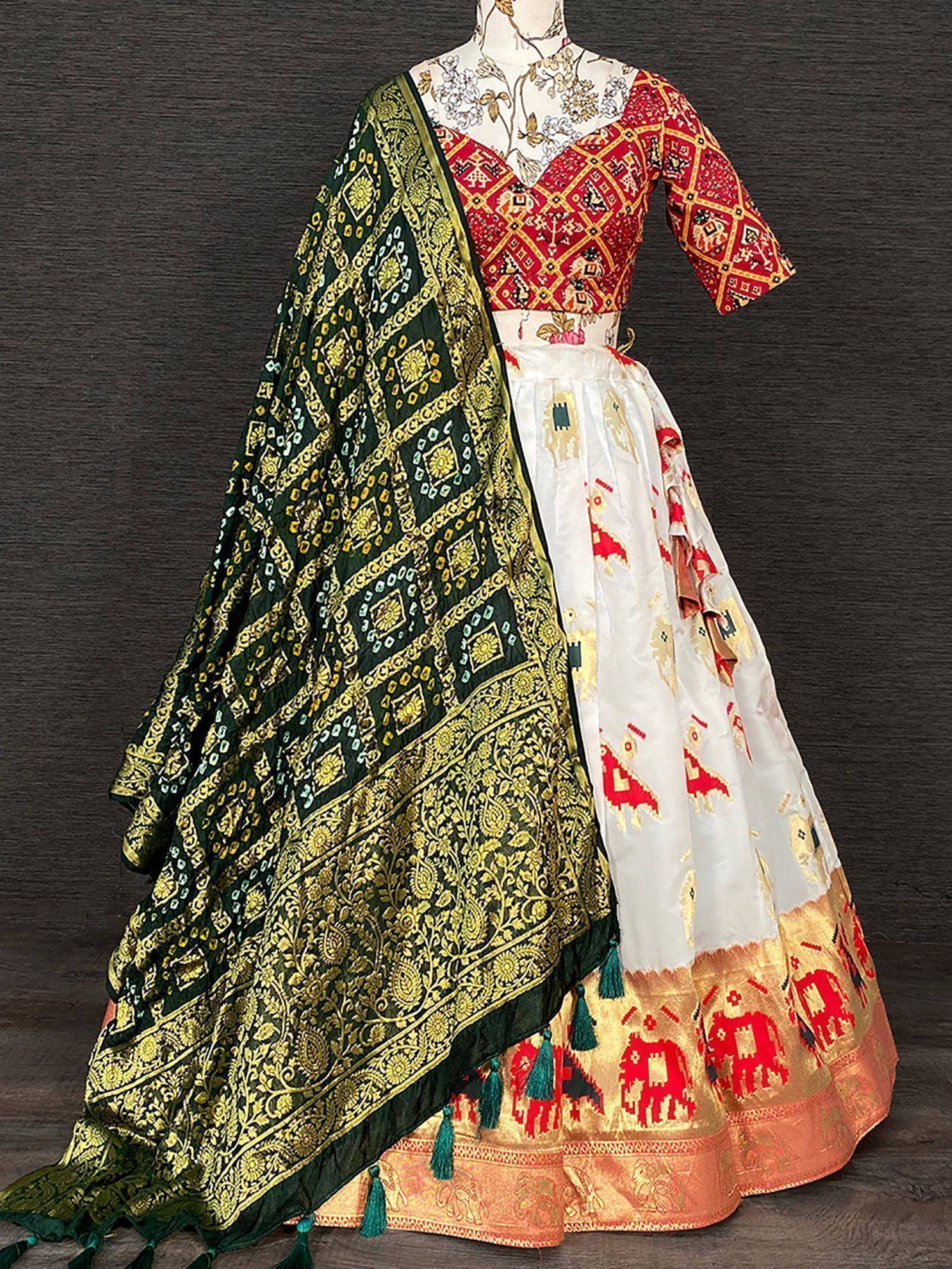 Red and white printed lehenga choli with green gold dupatta, ethnic Indian wear