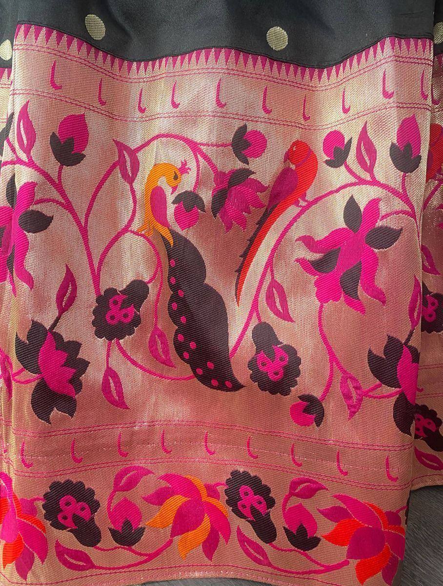 Vibrant pink and black peacock floral print ethnic fabric, ideal for designer lehenga or saree