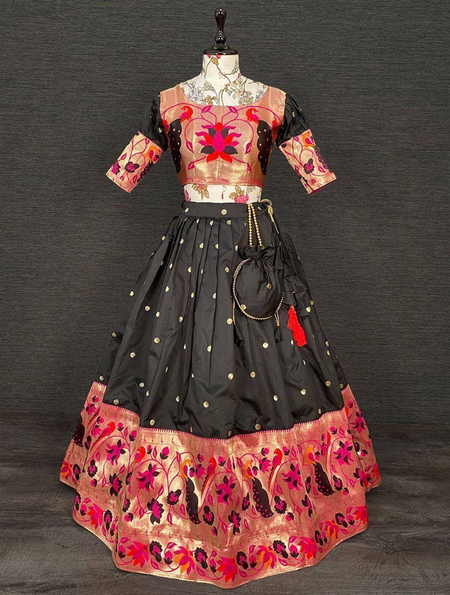 Black and pink floral embroidered lehenga choli with gold polka dots and matching potli bag