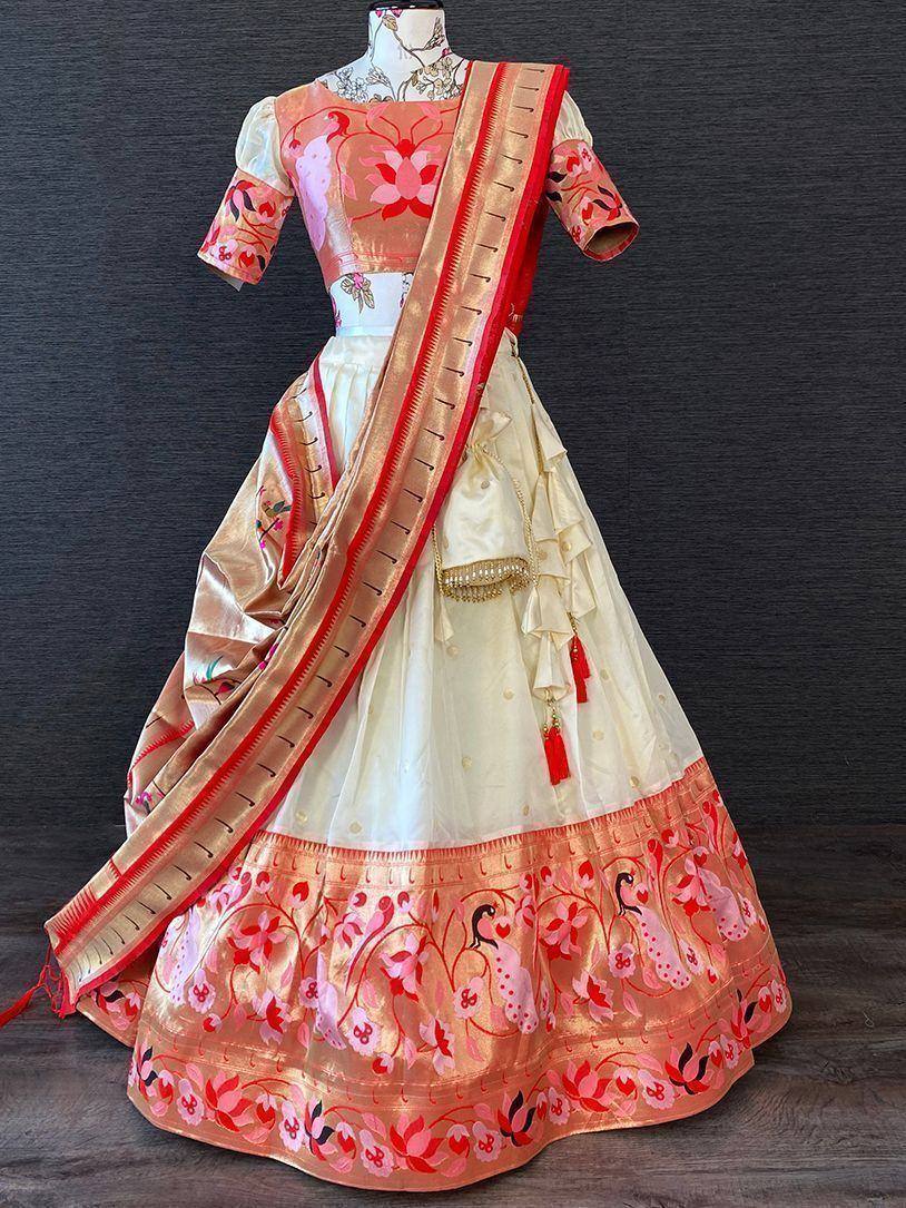 Pink and cream embroidered lehenga choli with floral peacock motifs, perfect for Indian ethnic wear occasions
