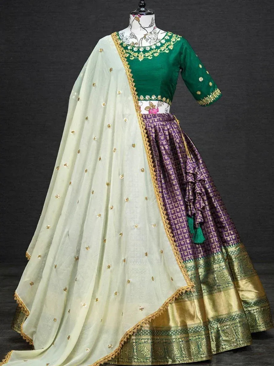 Green and purple designer lehenga choli with gold embroidery and sheer dupatta, ethnic Indian wear
