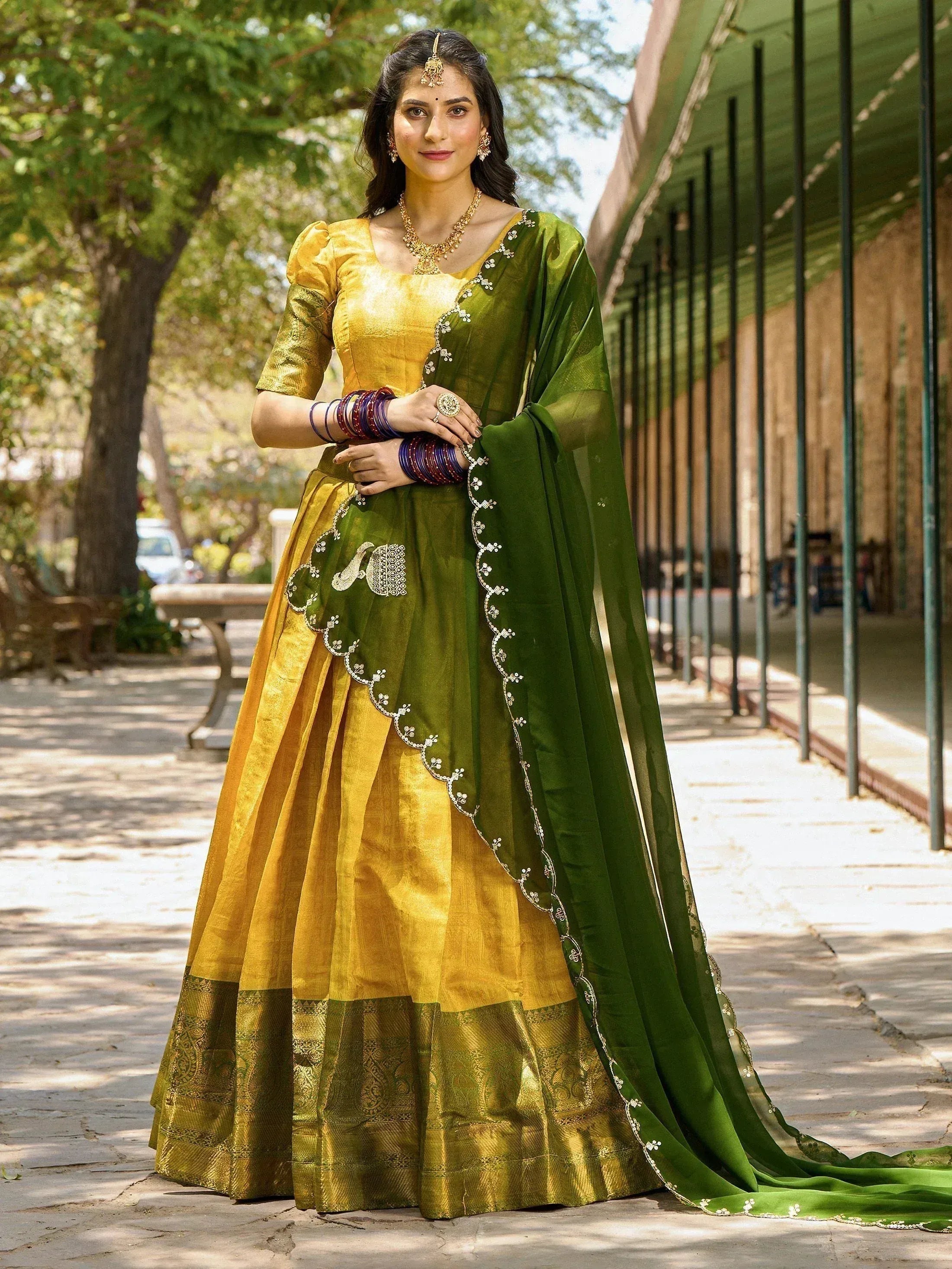 Yellow and green designer lehenga choli with embroidered dupatta, perfect for Indian ethnic occasions