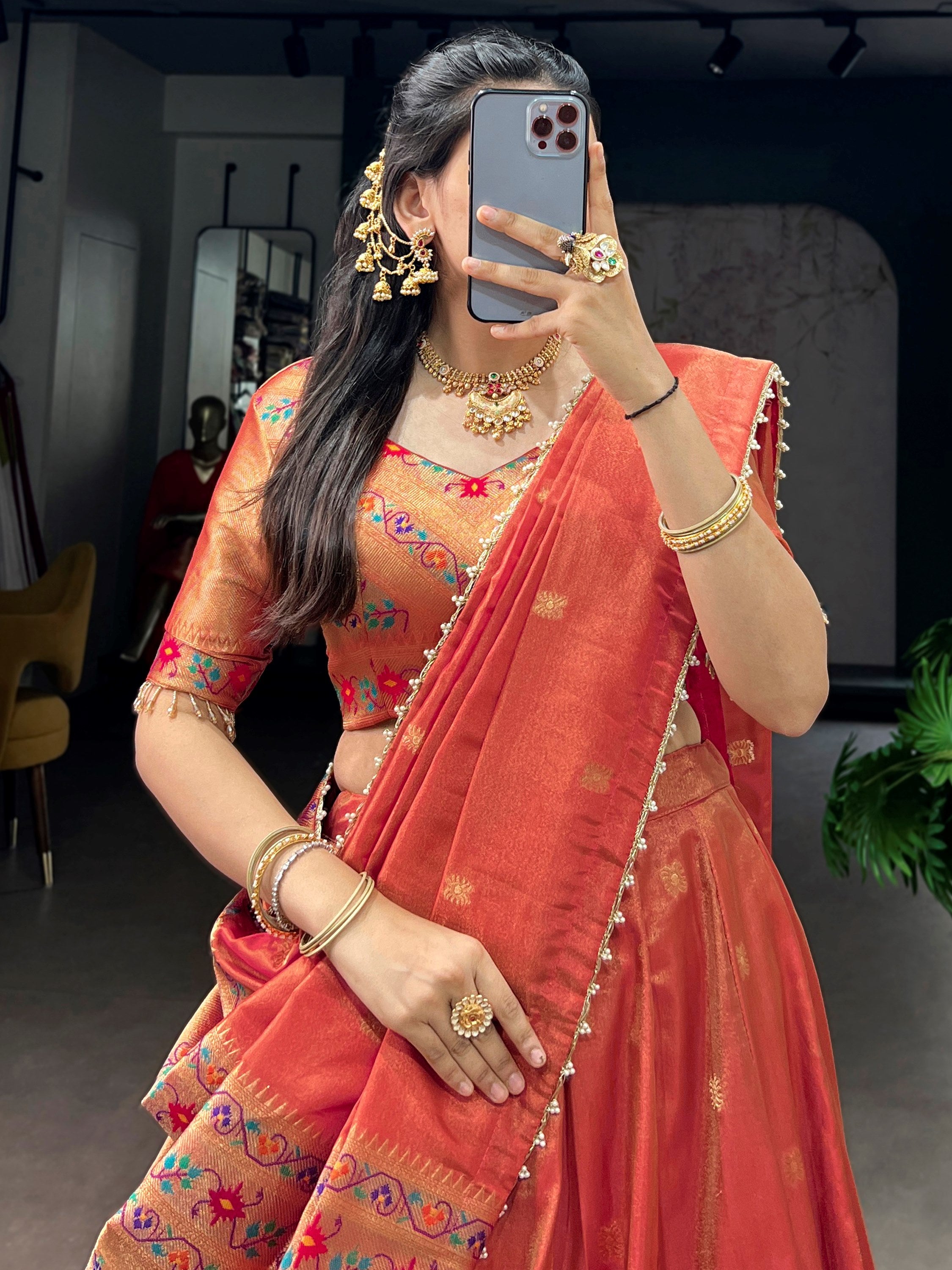 Wonderful Orange Zari Weaving Shimmer Festive Wear Lehenga Choli