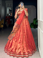 Wonderful Orange Zari Weaving Shimmer Festive Wear Lehenga Choli