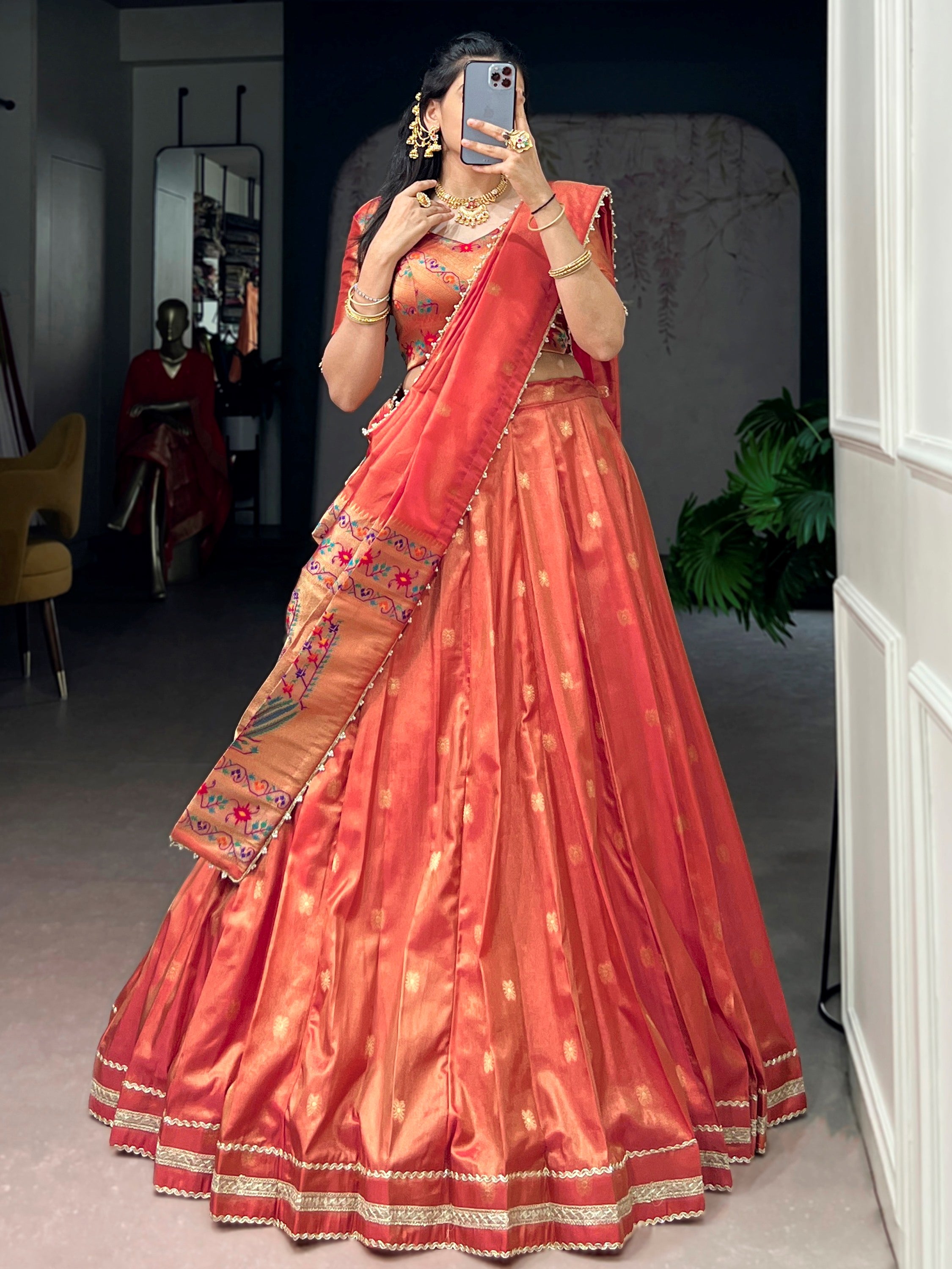 Wonderful Orange Zari Weaving Shimmer Festive Wear Lehenga Choli