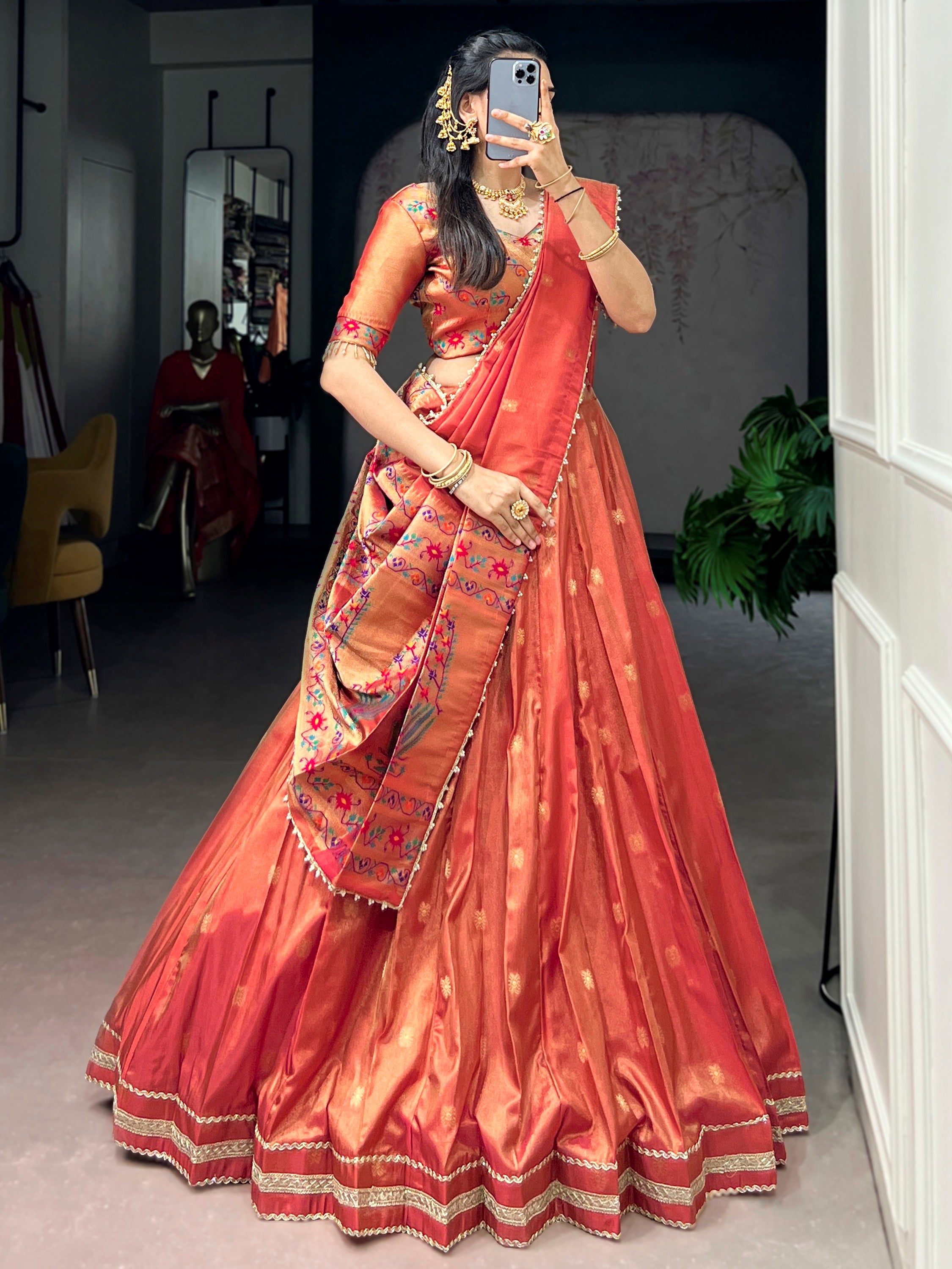 Wonderful Orange Zari Weaving Shimmer Festive Wear Lehenga Choli