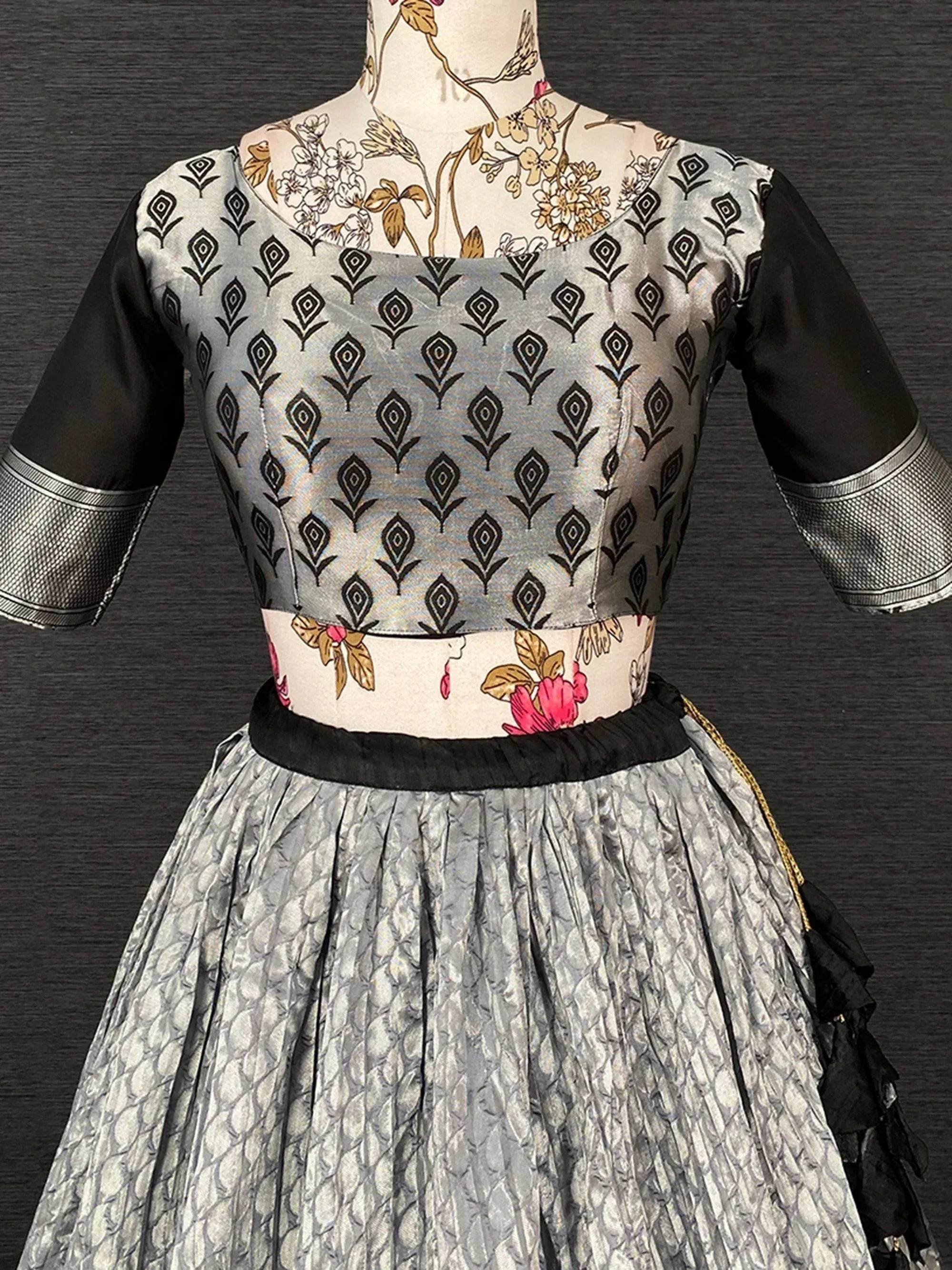 Grey and black ethnic gown with floral waistband and geometric print, perfect for Indian occasions