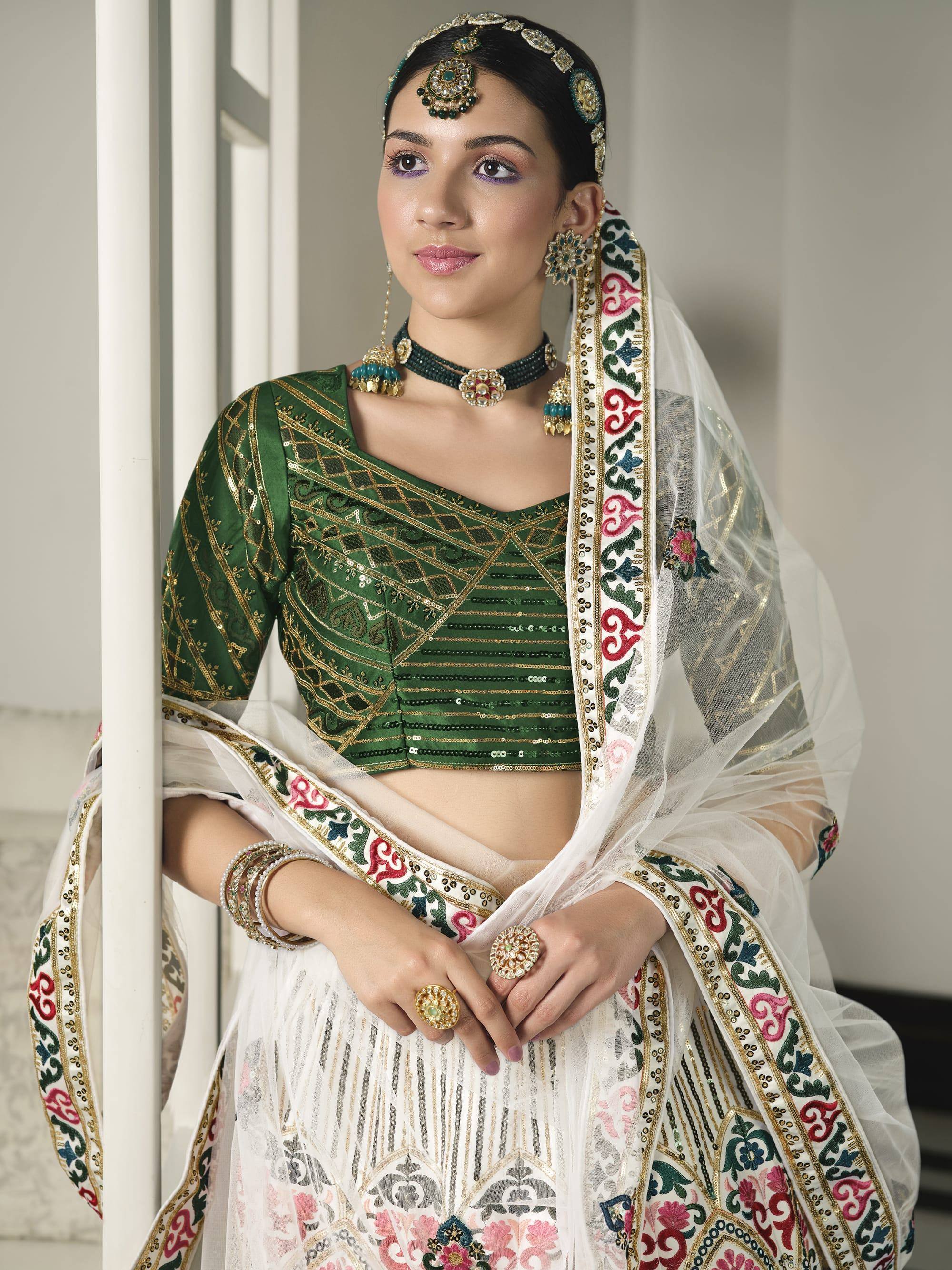 Euphoric White Heavy Sequins Embroidered Silk Wedding Lehenga Choli