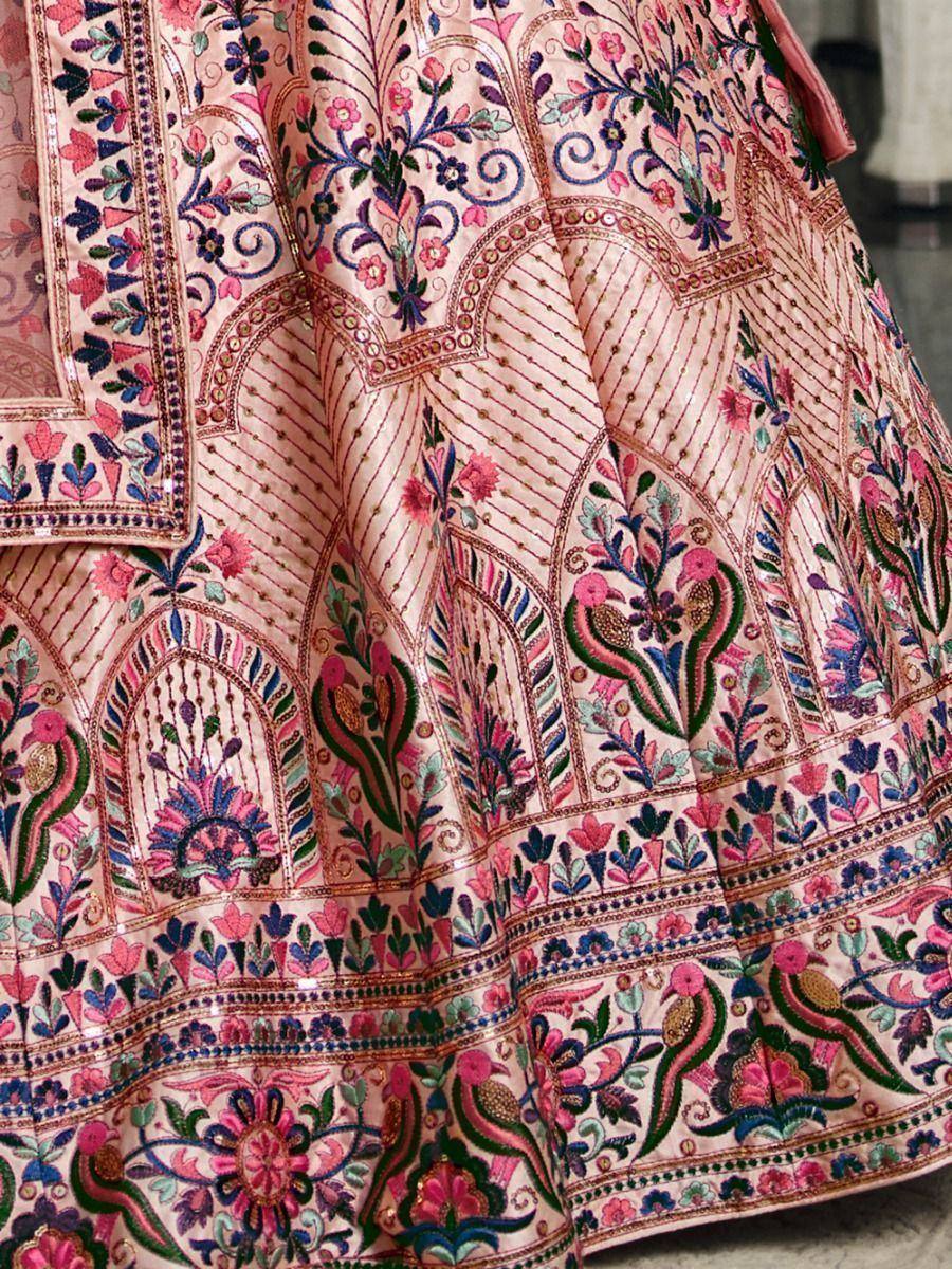 Pink embroidered lehenga with floral and bird motifs, perfect for Indian ethnic wear