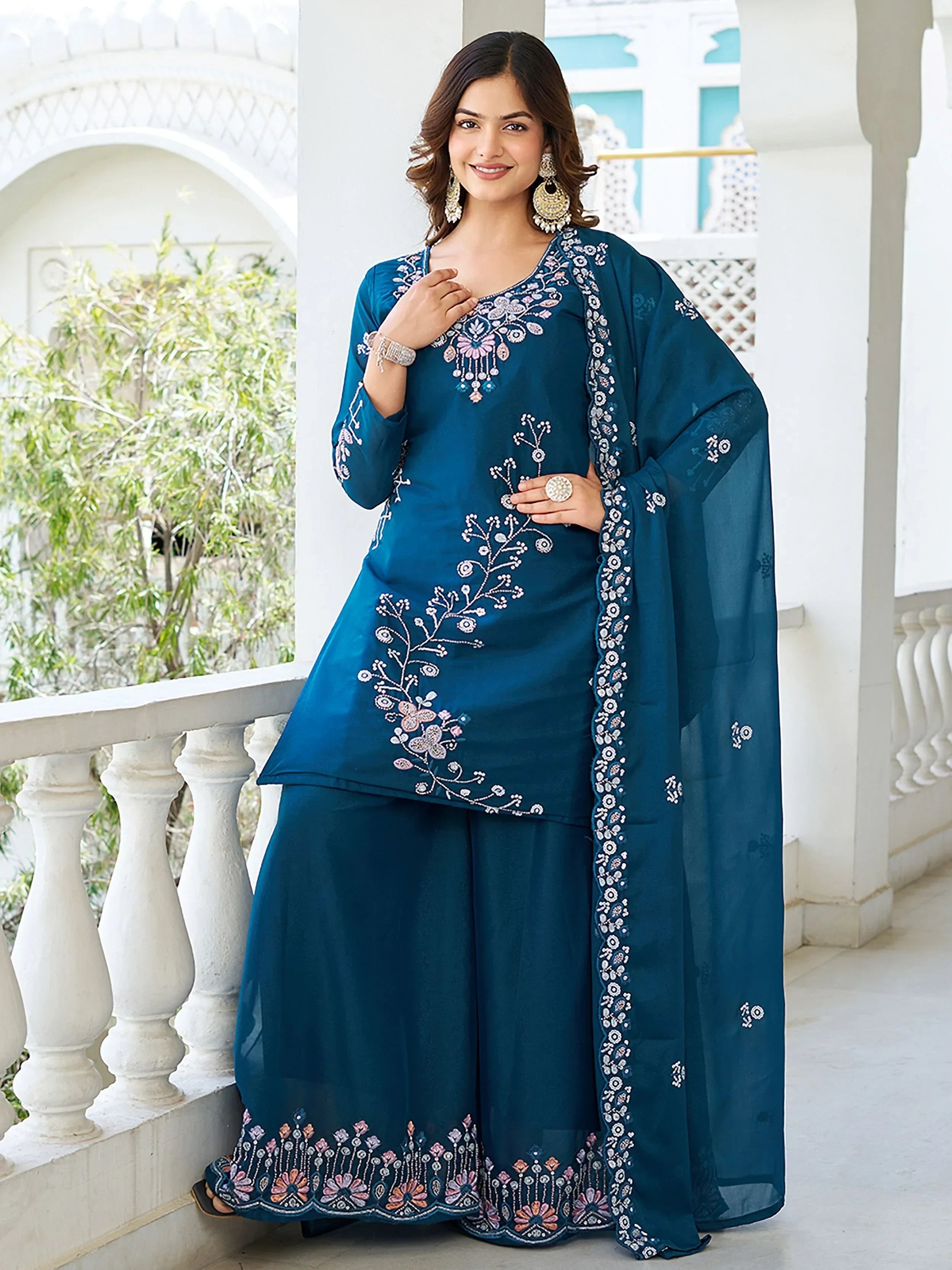 Mesmerizing Blue Georgette Sequins Embroidered Palazzo Suit