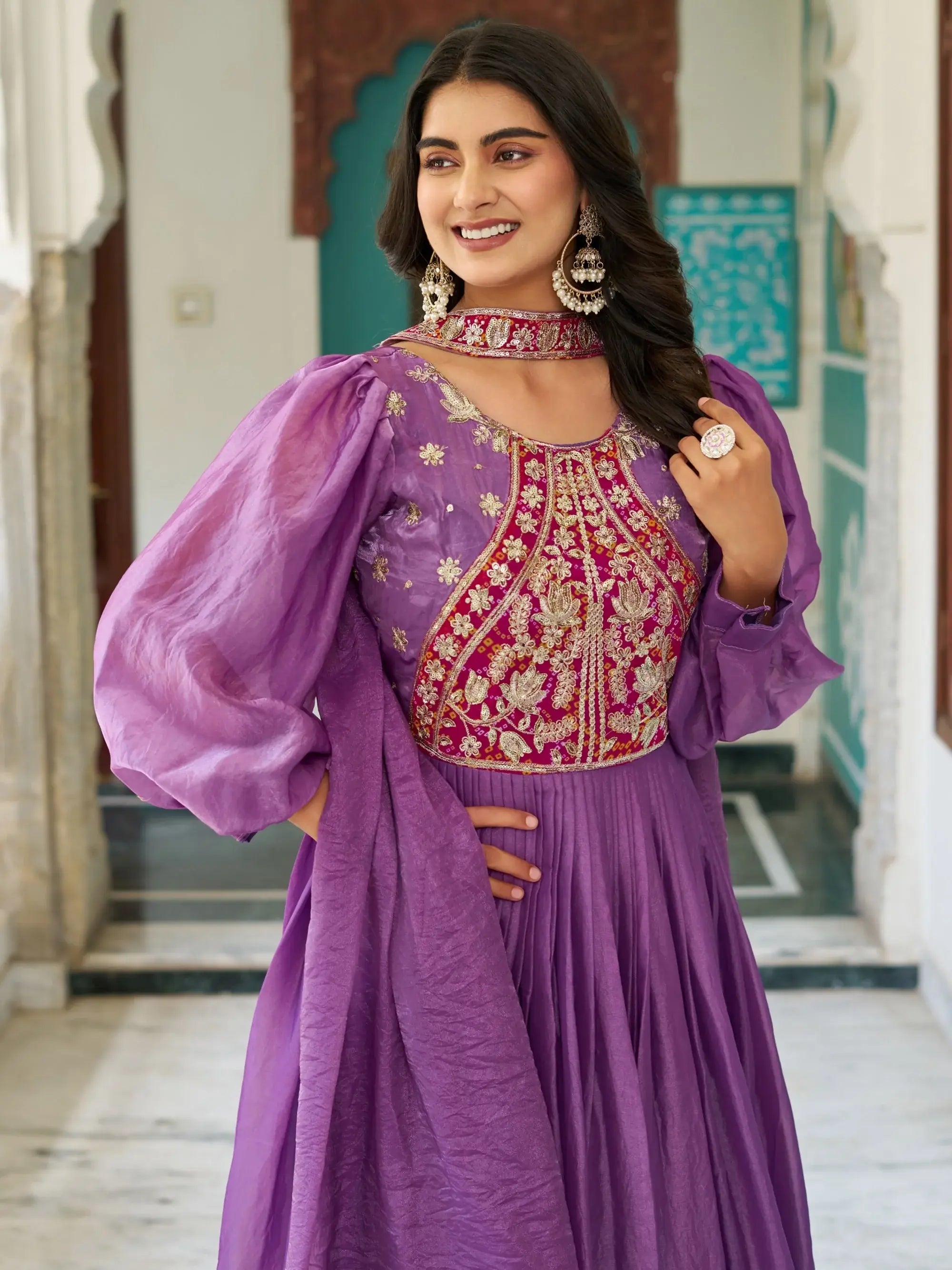 Glamorous Purple Embroidered Silk Wedding Wear Gown With Dupatta