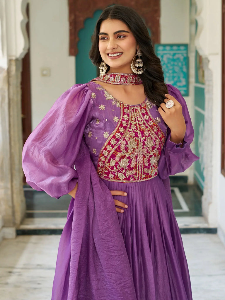 Glamorous Purple Embroidered Silk Wedding Wear Gown With Dupatta