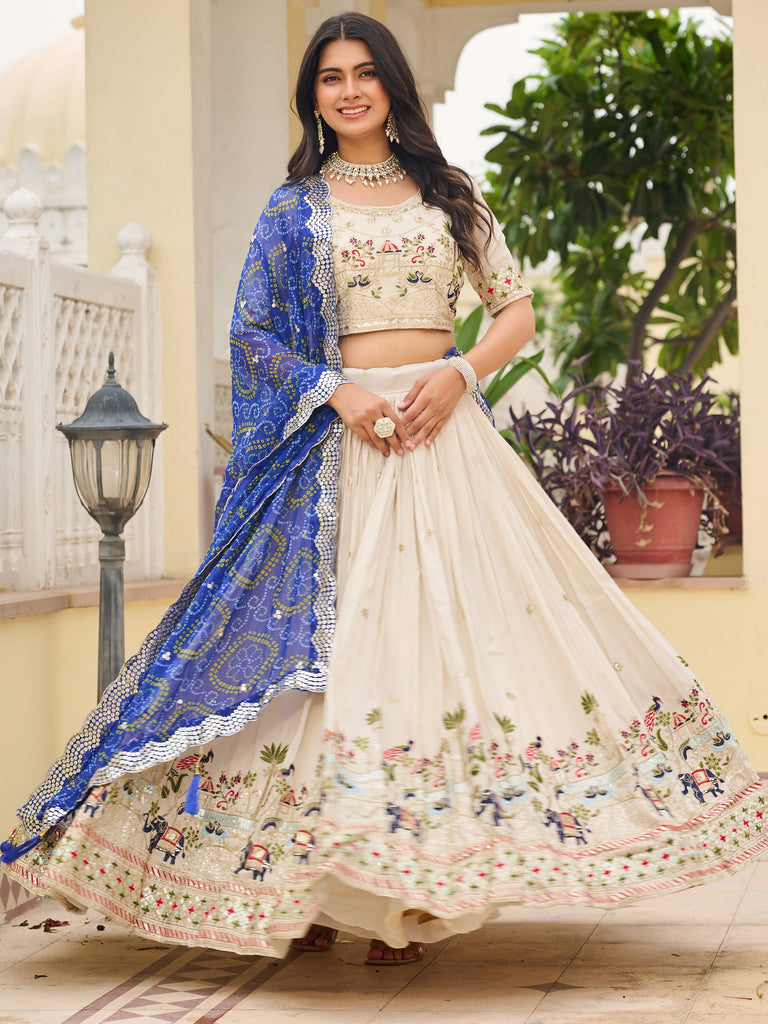 Graceful Off-White Sequnis Silk Lehenga Choli With Blue Dupatta 