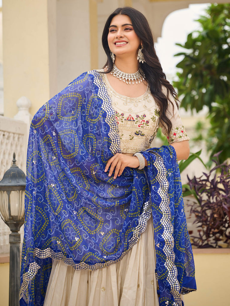 Graceful Off-White Sequnis Silk Lehenga Choli With Blue Dupatta 
