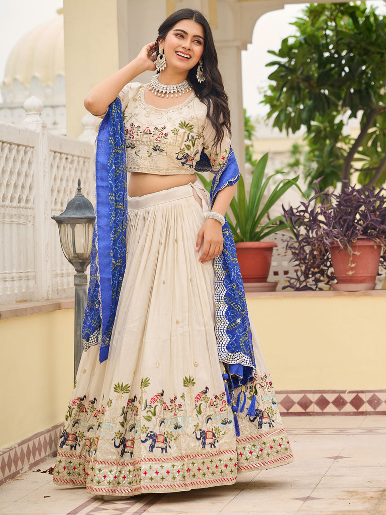 Graceful Off-White Sequnis Silk Lehenga Choli With Blue Dupatta 