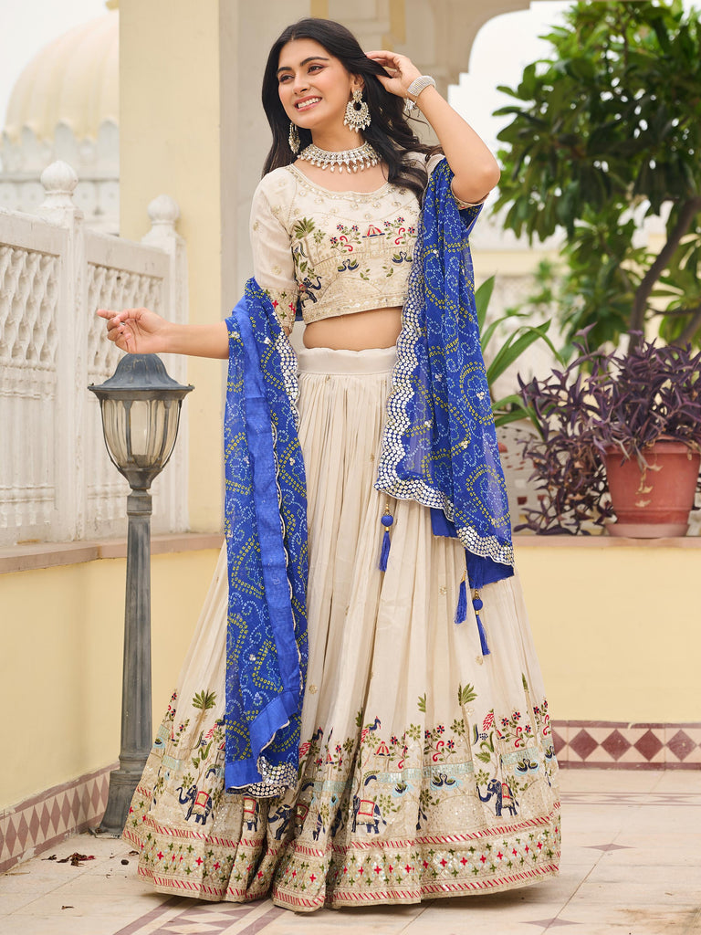 Graceful Off-White Sequnis Silk Lehenga Choli With Blue Dupatta 