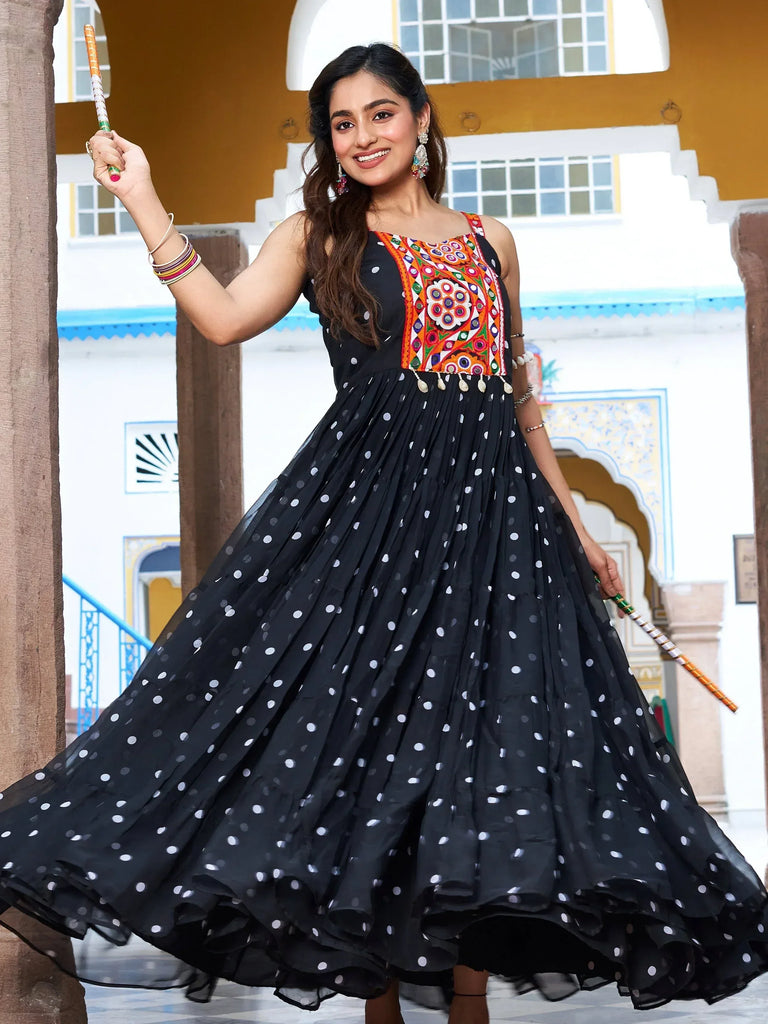 Black polka dot ethnic gown with colorful embroidery, perfect for festive occasions and traditional events.