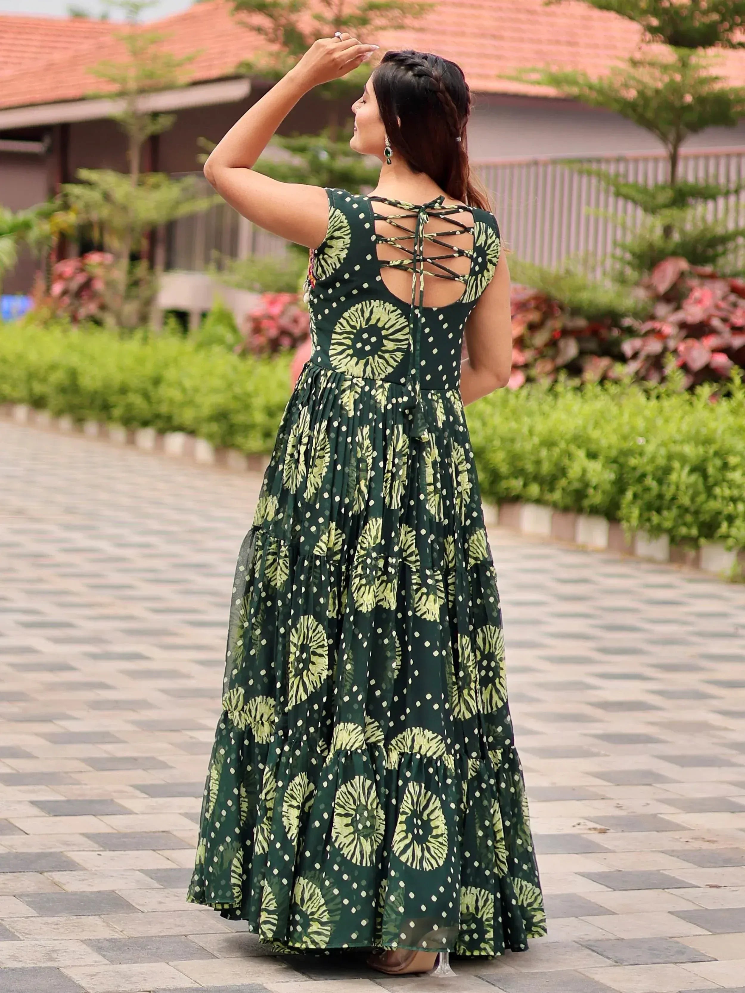 Green floral print ethnic gown with back crisscross tie, perfect for Indian occasions