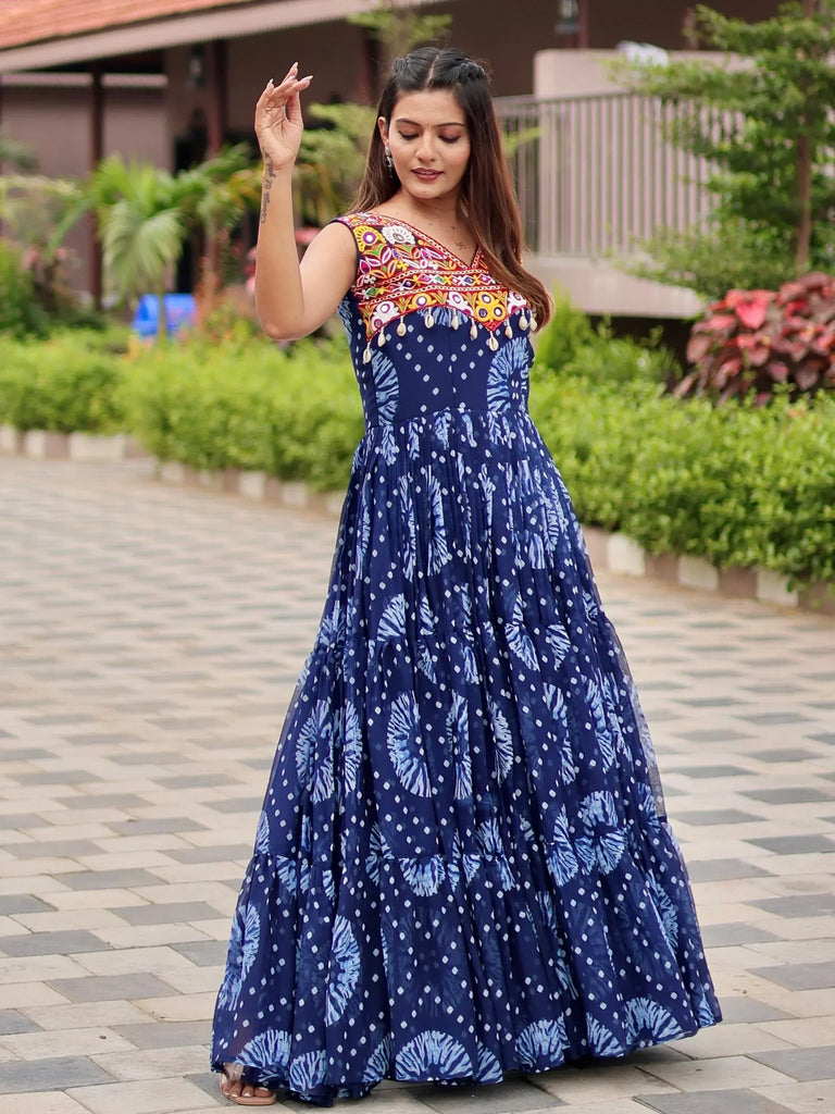 Blue ethnic gown with colorful embroidery and floral print, perfect for Indian occasions
