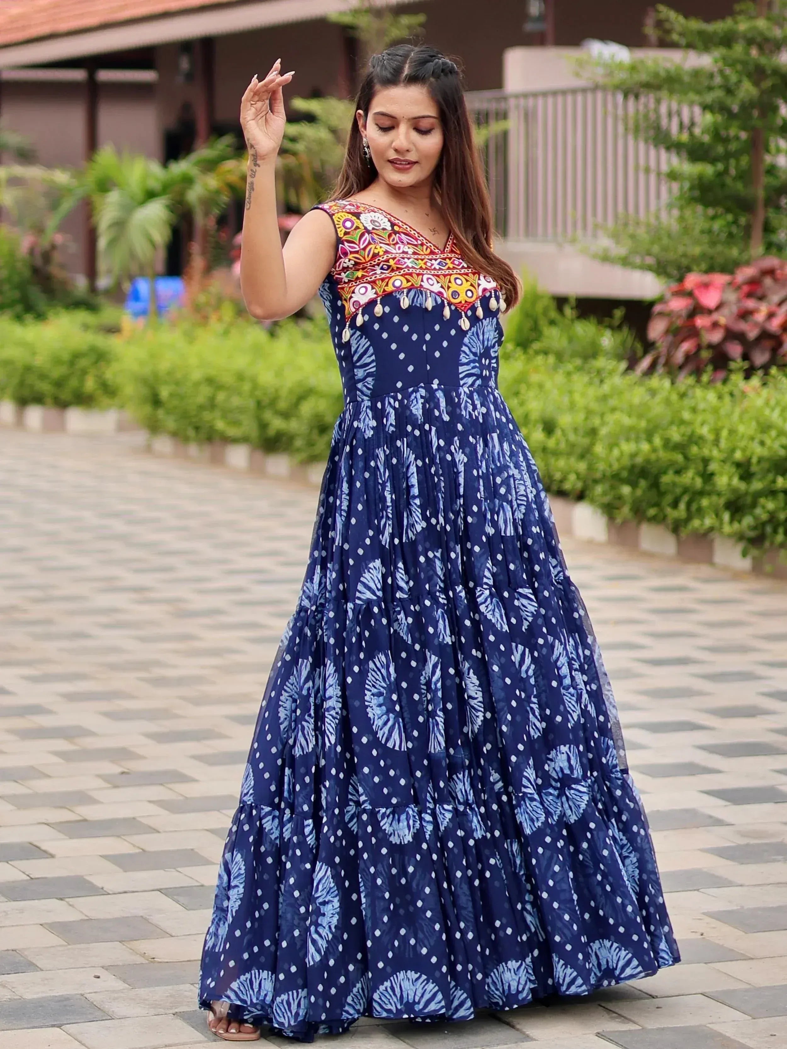 Blue ethnic gown with colorful embroidery and floral print, perfect for Indian occasions