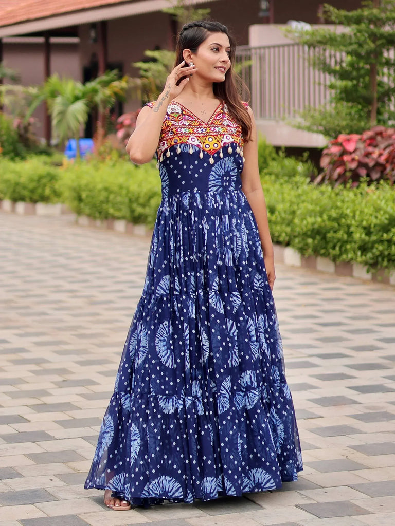 Blue ethnic gown with colorful embroidery and tie-dye print, perfect for Indian occasions