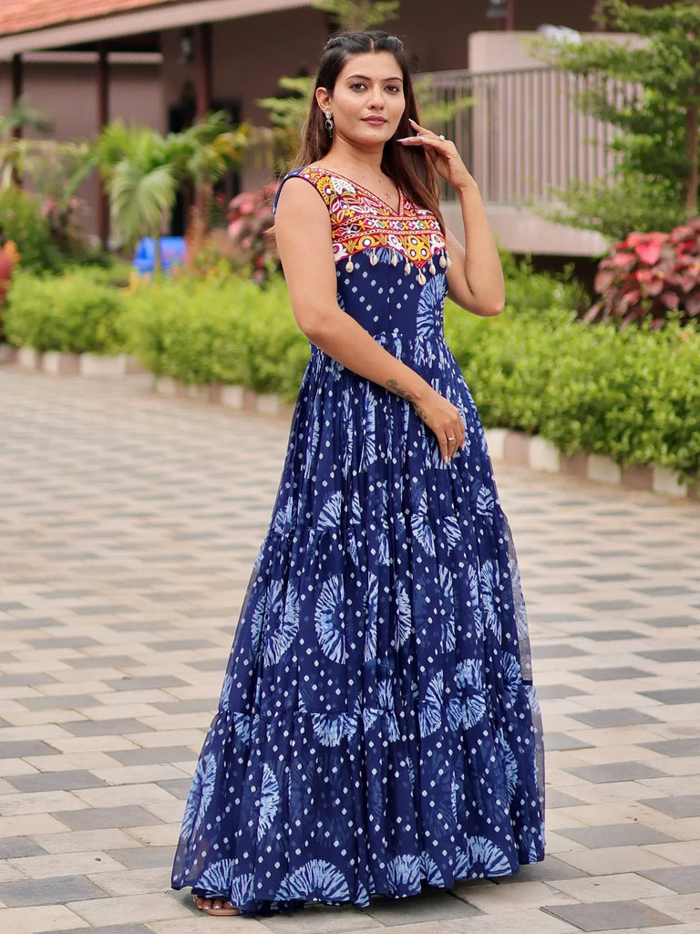 Blue ethnic gown with colorful embroidery and tie-dye print, perfect for Indian occasions