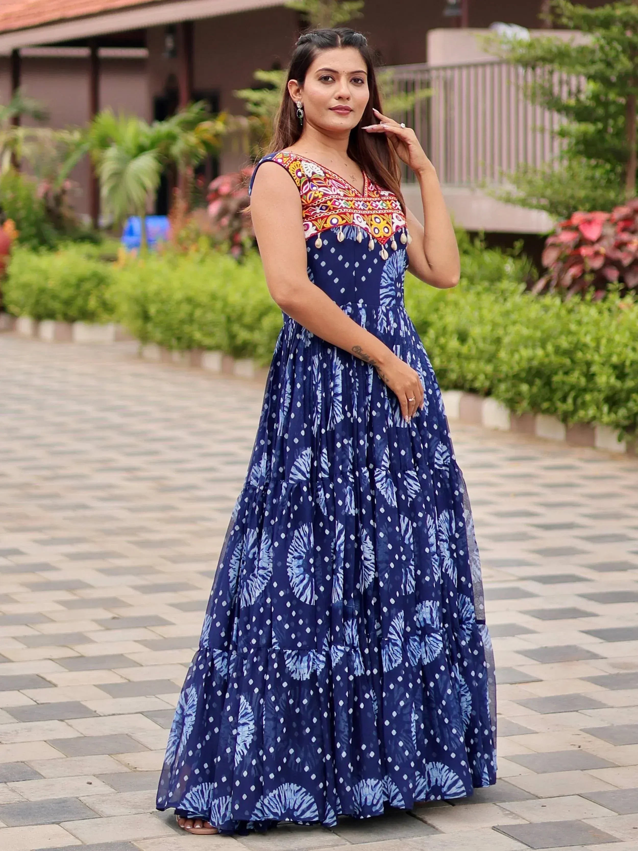 Blue ethnic gown with colorful embroidery and tie-dye print, perfect for Indian occasions