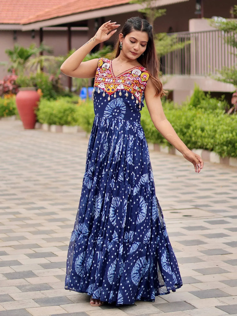 Blue ethnic gown with colorful embroidered bodice and floral print, perfect for Indian occasions