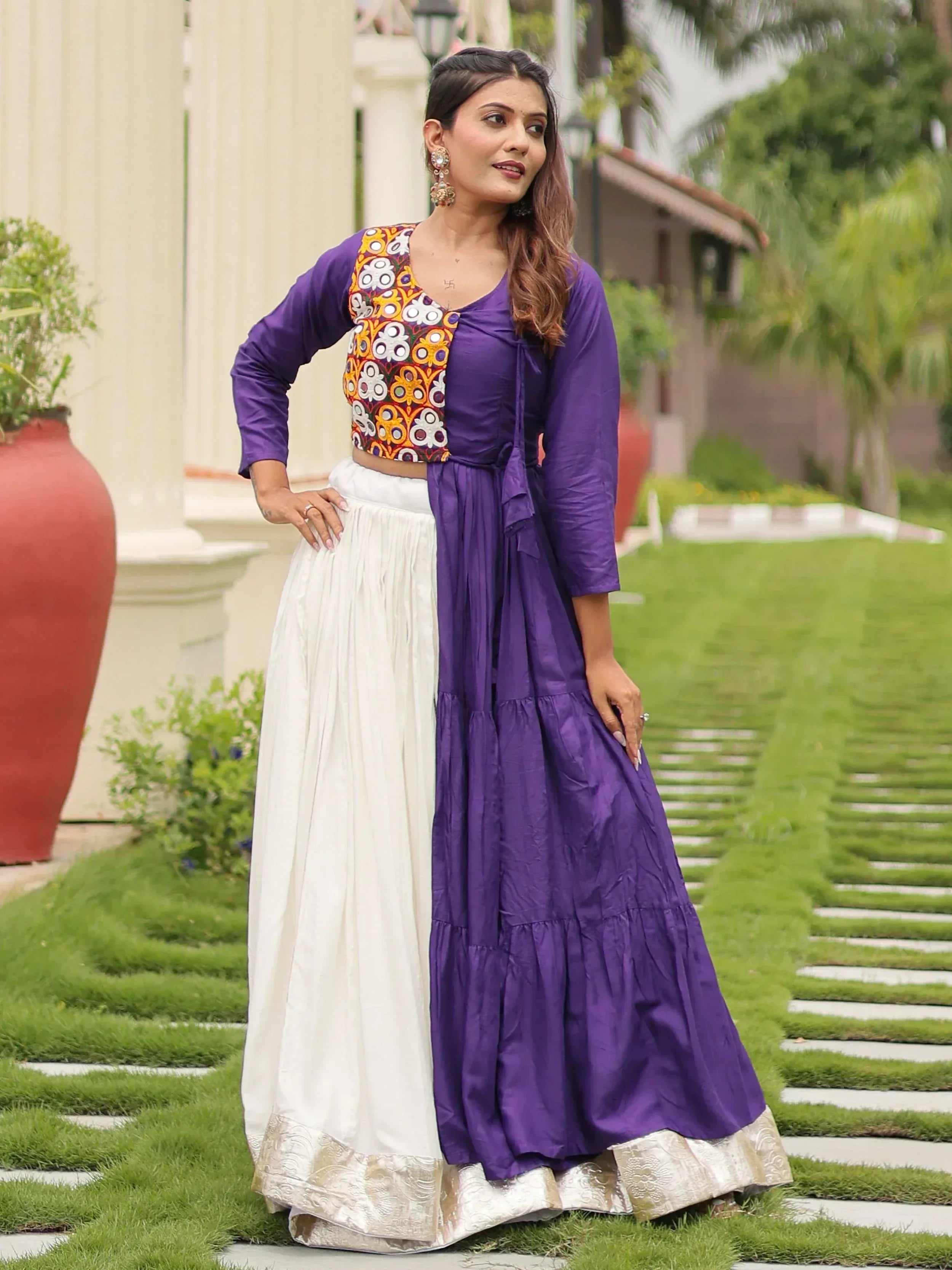 Purple and white ethnic gown with embroidered crop top, perfect for Indian occasions and festive wear.