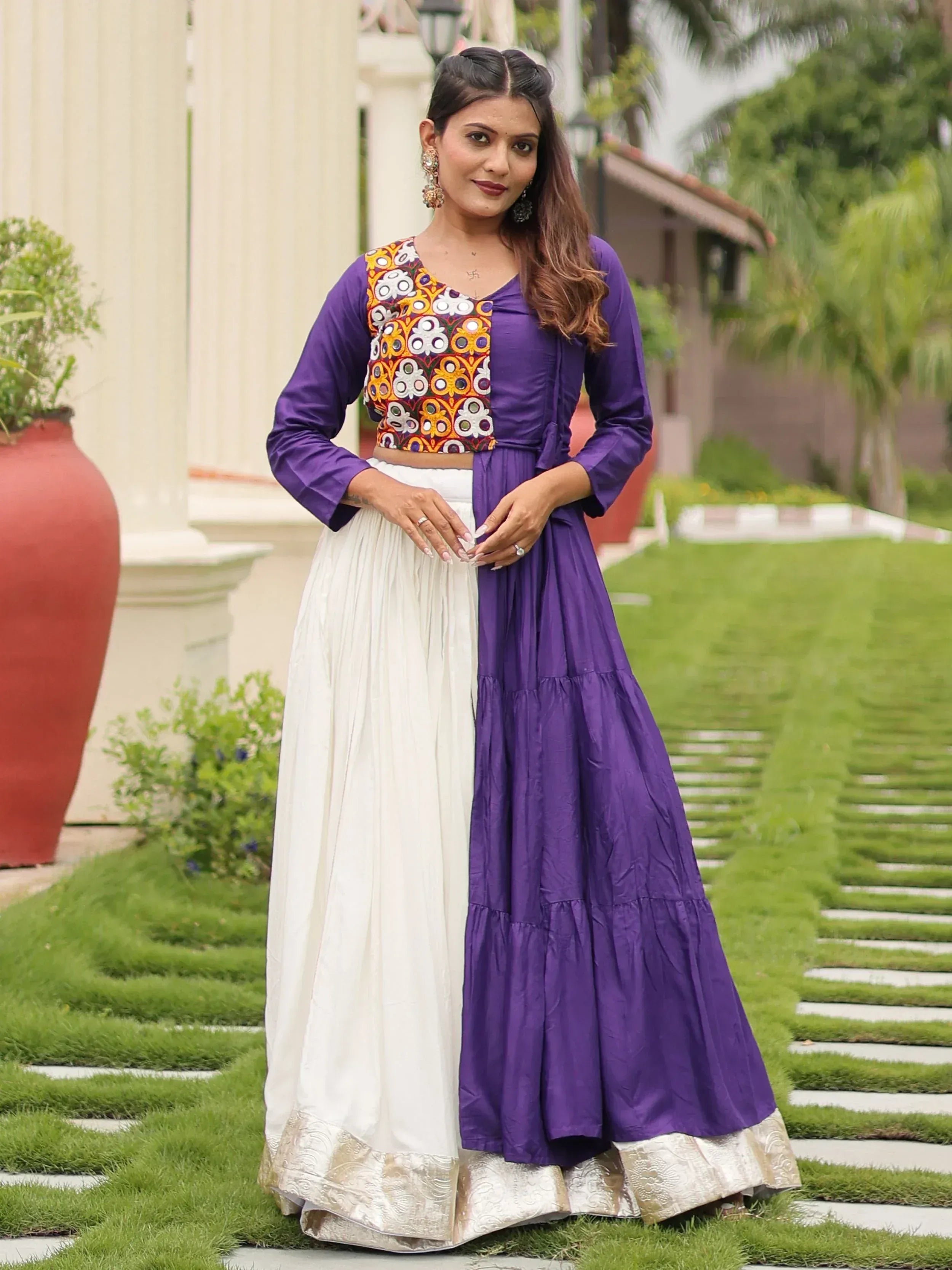Purple and white ethnic gown with embroidered crop top, perfect for Indian occasions and festive wear.