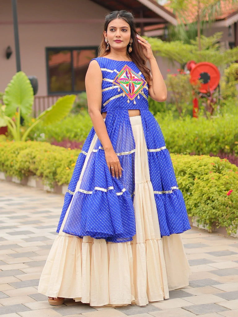 Blue and cream ethnic lehenga choli with mirror work, perfect for Indian weddings and festivals