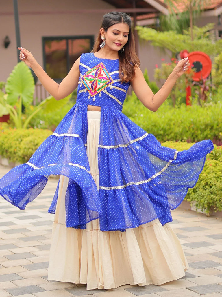 Blue polka dot ethnic gown with embroidered yoke and flared skirt, perfect for Indian occasions