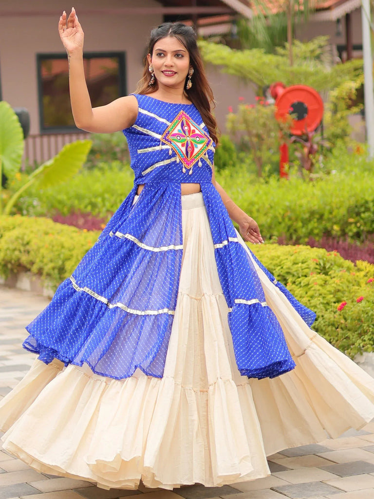 Blue and cream ethnic lehenga choli with mirror work, perfect for Indian festivals and weddings