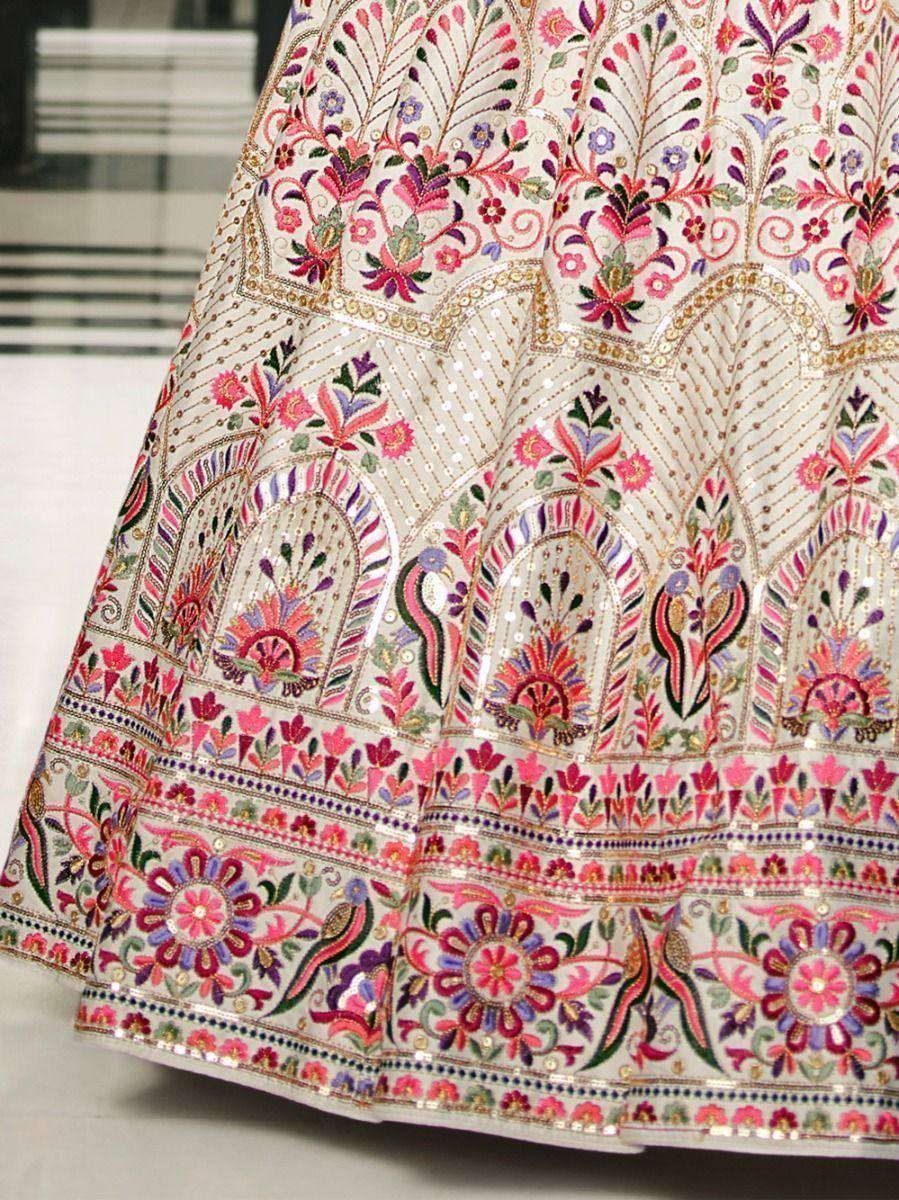 Heavily embroidered floral lehenga skirt with pink, purple, and gold detailing, perfect for Indian ethnic wear.