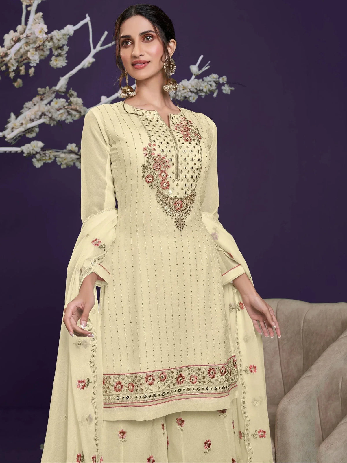 Cream floral embroidered salwar kameez with bell sleeves, perfect for ethnic occasions