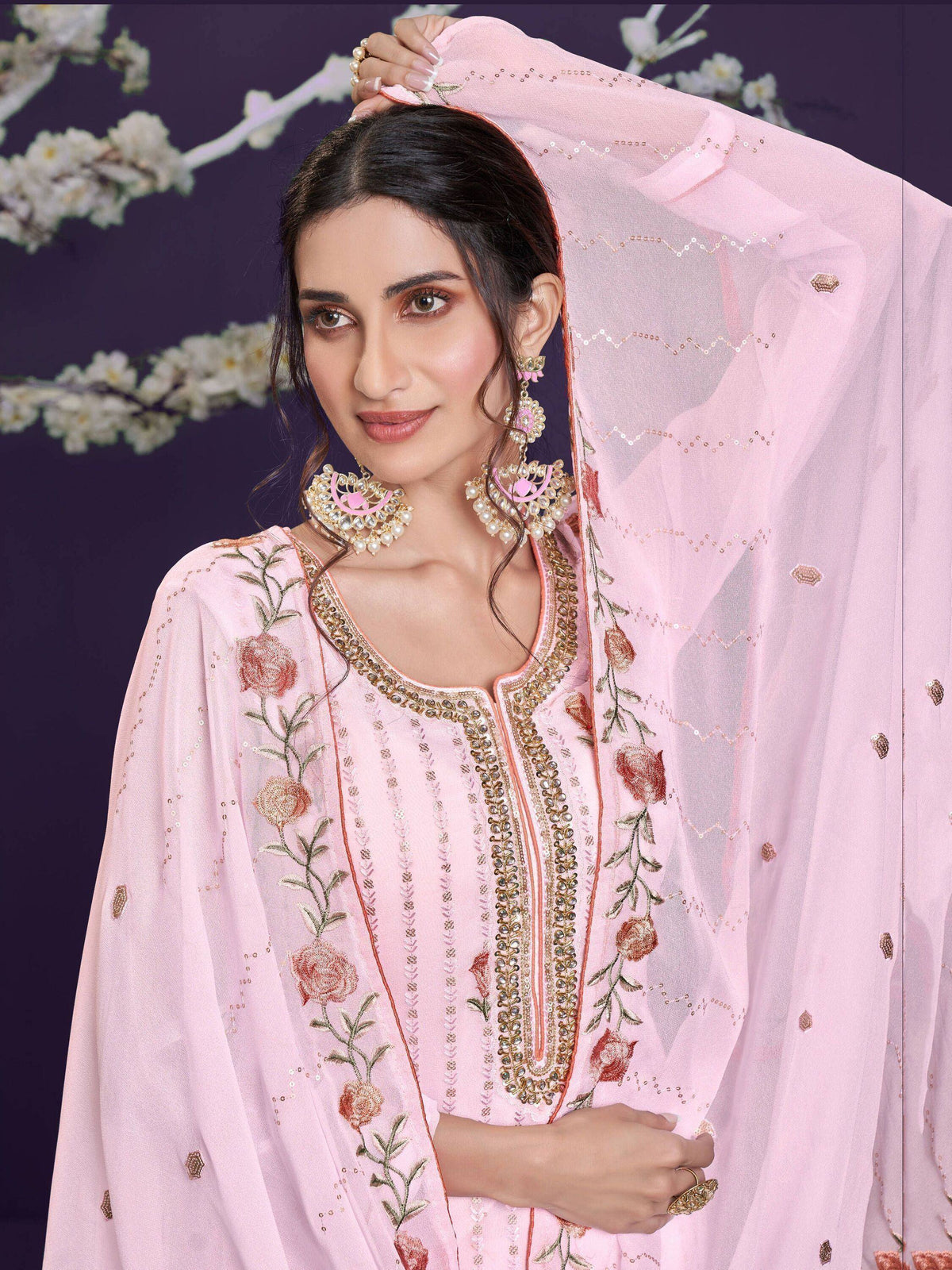 Pink embroidered salwar kameez with floral design and matching dupatta, ideal for Indian ethnic occasions