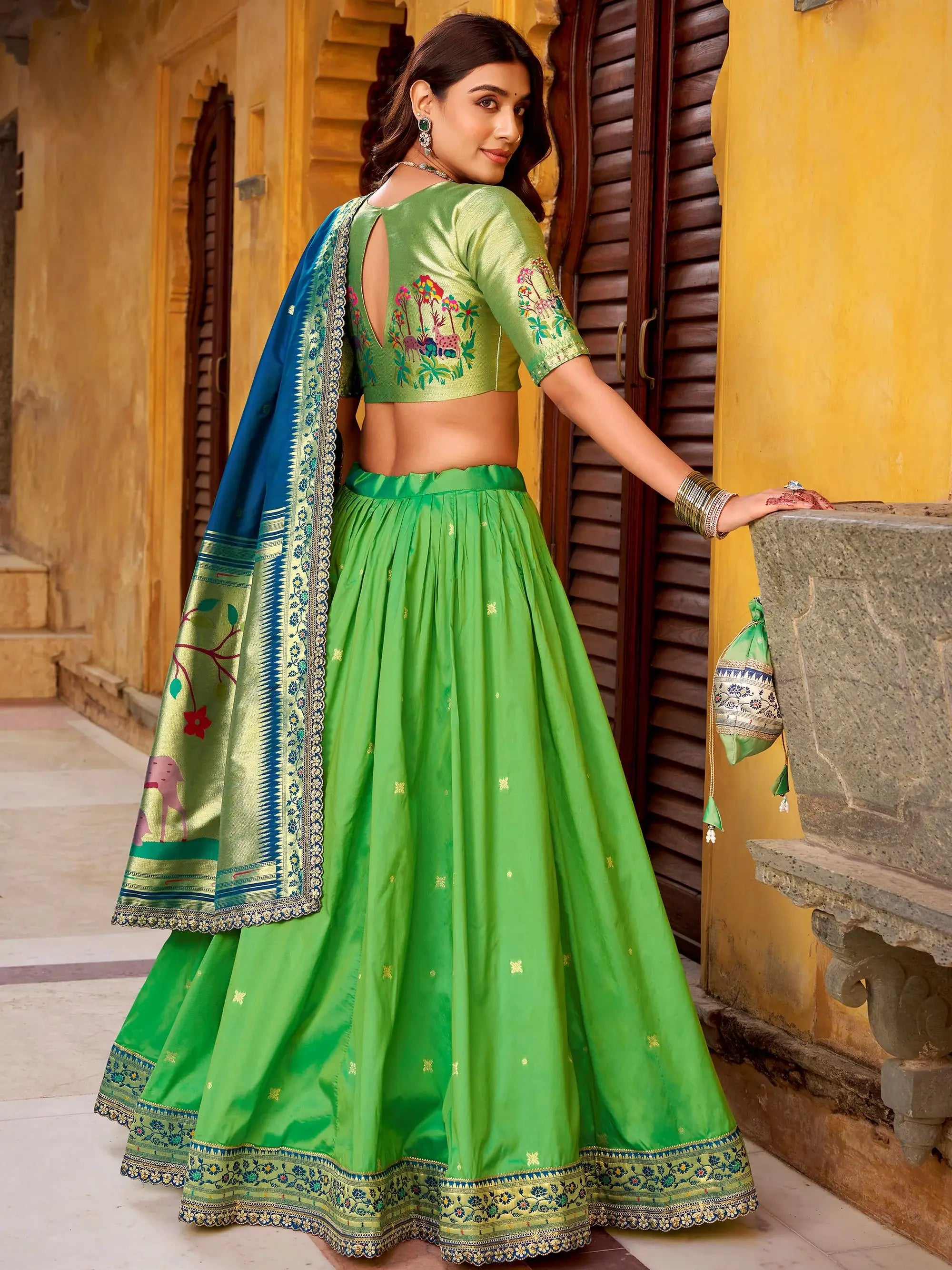 Beautiful Green Zari Weaving Silk Wedding Wear Lehenga Choli