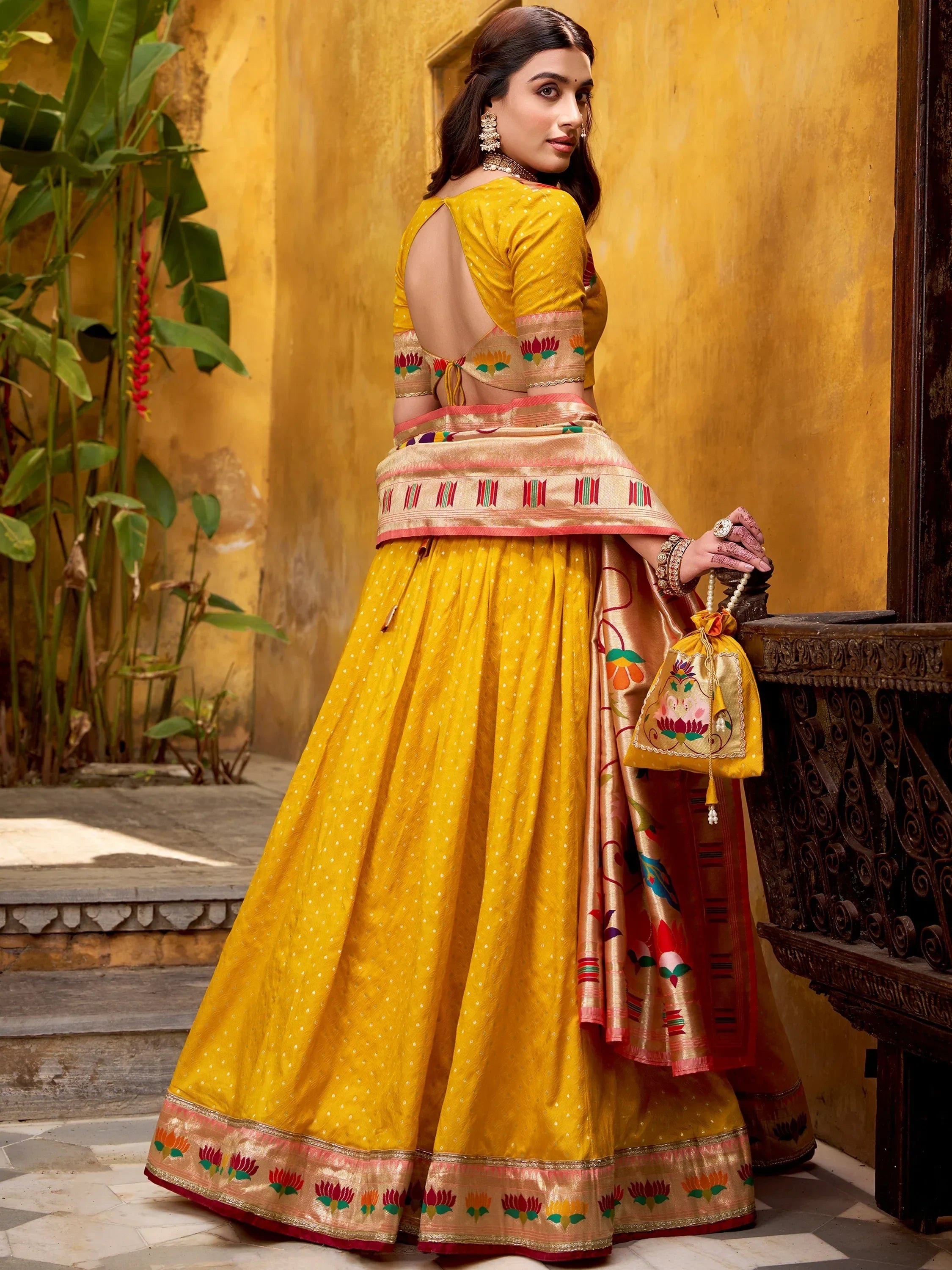 Charming Yellow Zari Weaving Silk Wedding Wear Lehenga Choli
