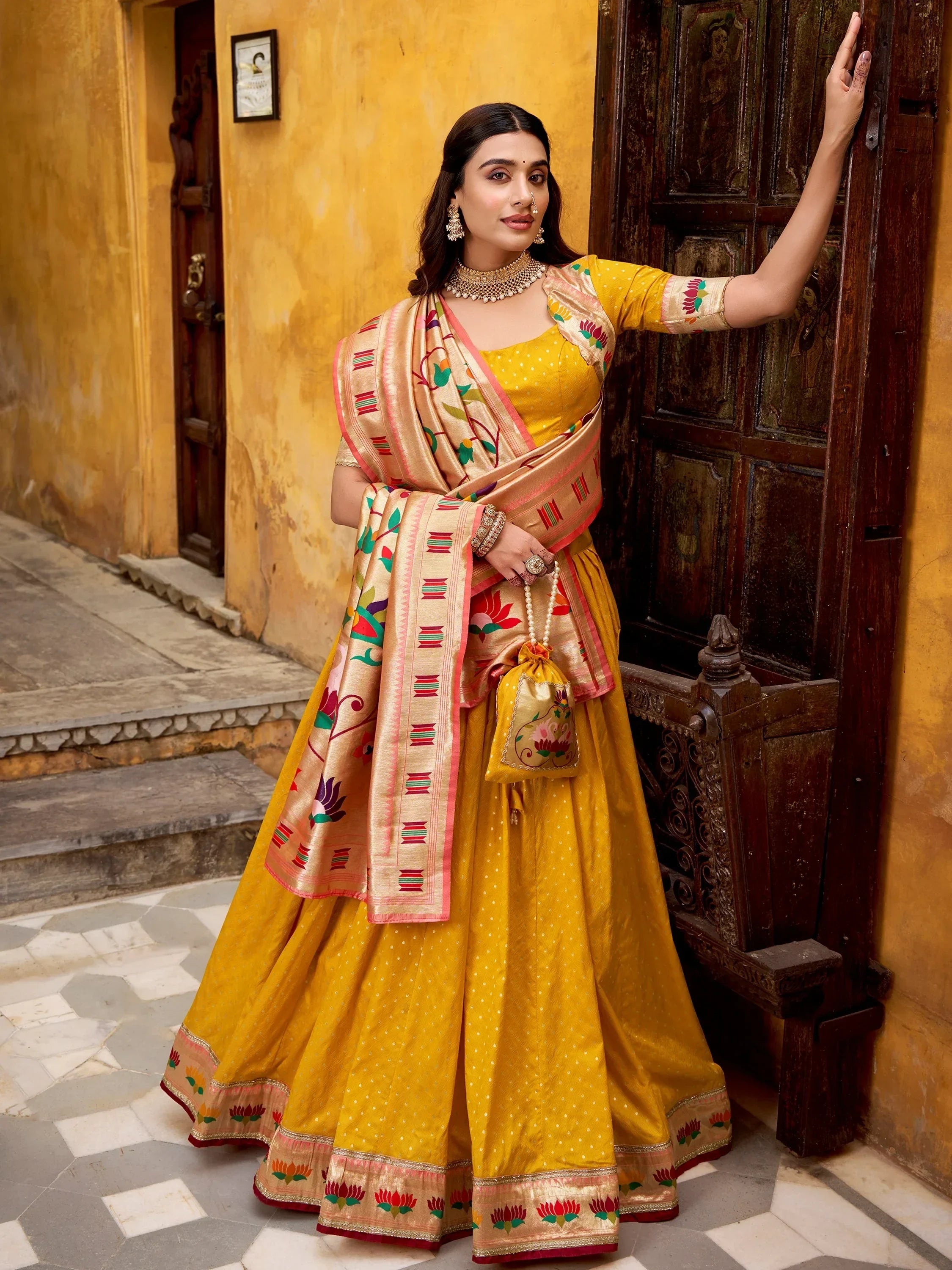 Charming Yellow Zari Weaving Silk Wedding Wear Lehenga Choli