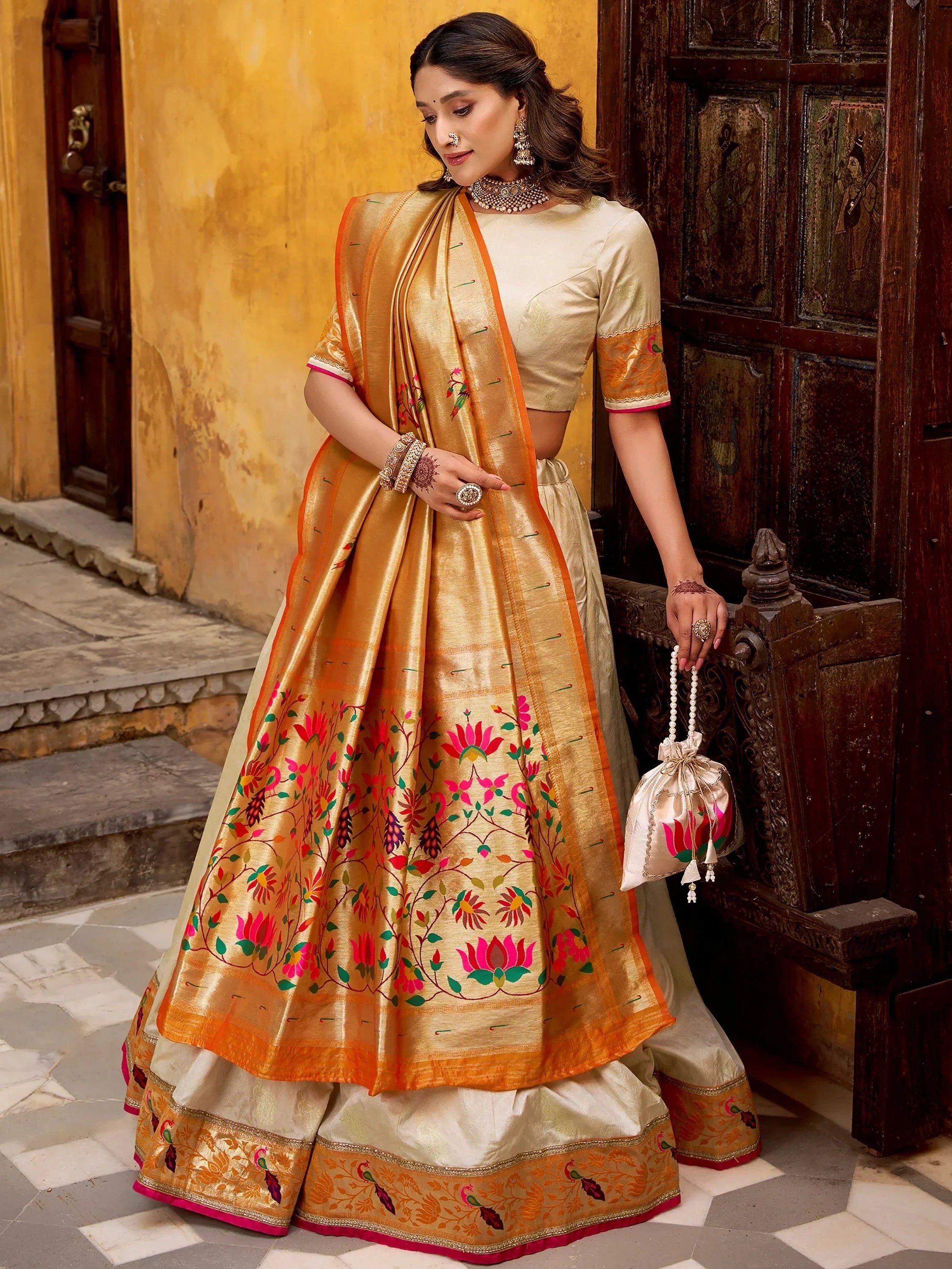 Dazzling Off-White Zari Weaving Silk Function Wear Lehenga Choli
