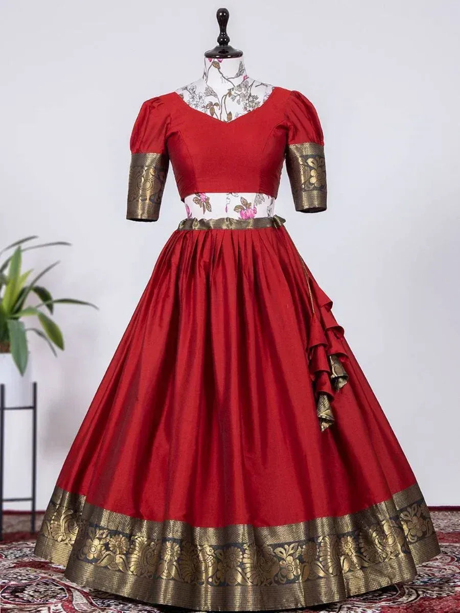 Red ethnic gown with gold border and floral waistband, perfect for Indian occasions