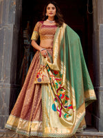 Bewitching Brown Zari Weaving Silk Festival Wear Lehenga Choli With Dupatta