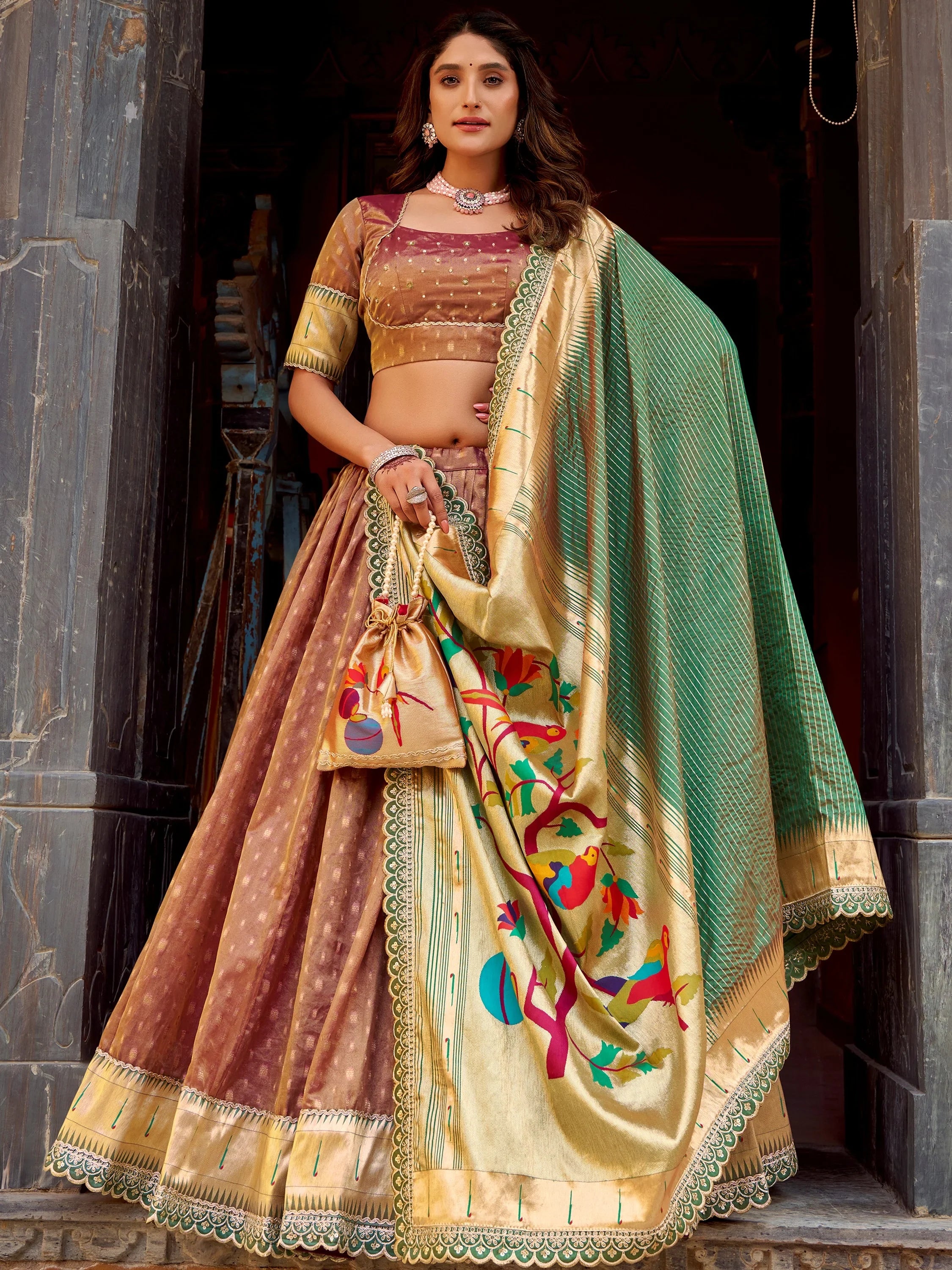 Bewitching Brown Zari Weaving Silk Festival Wear Lehenga Choli With Dupatta
