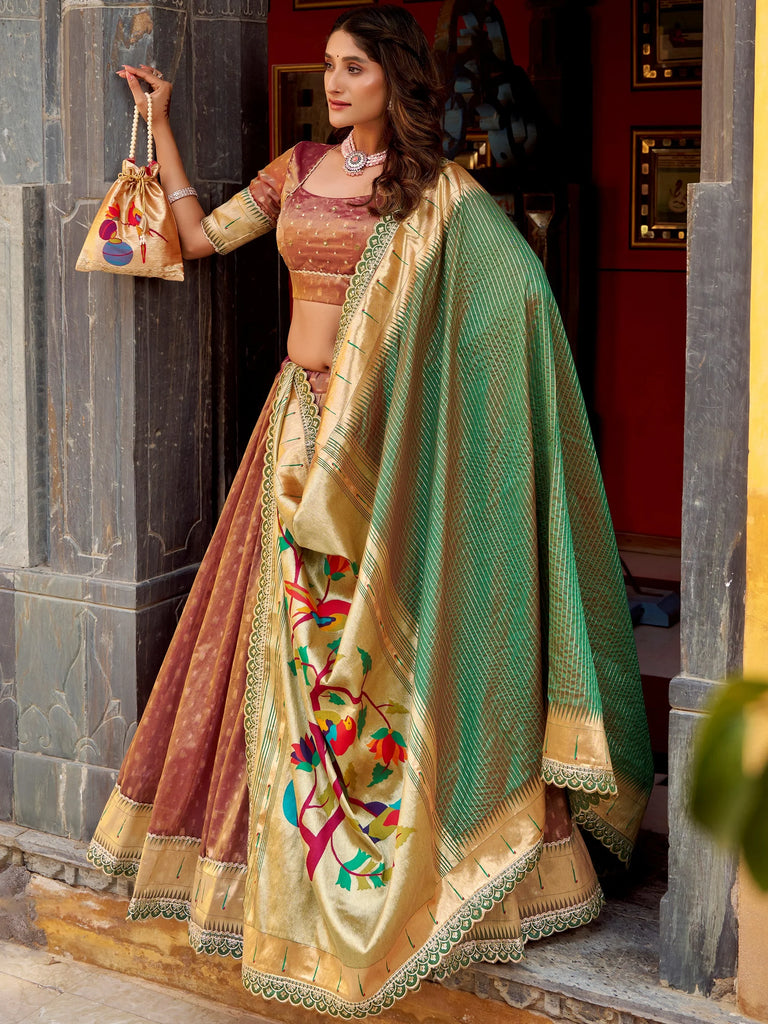 Bewitching Brown Zari Weaving Silk Festival Wear Lehenga Choli With Dupatta