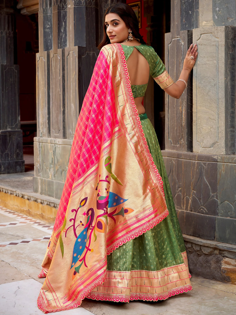 Fabulous Green Zari Weaving Silk Mehendi Wear Lehenga Choli With Dupatta