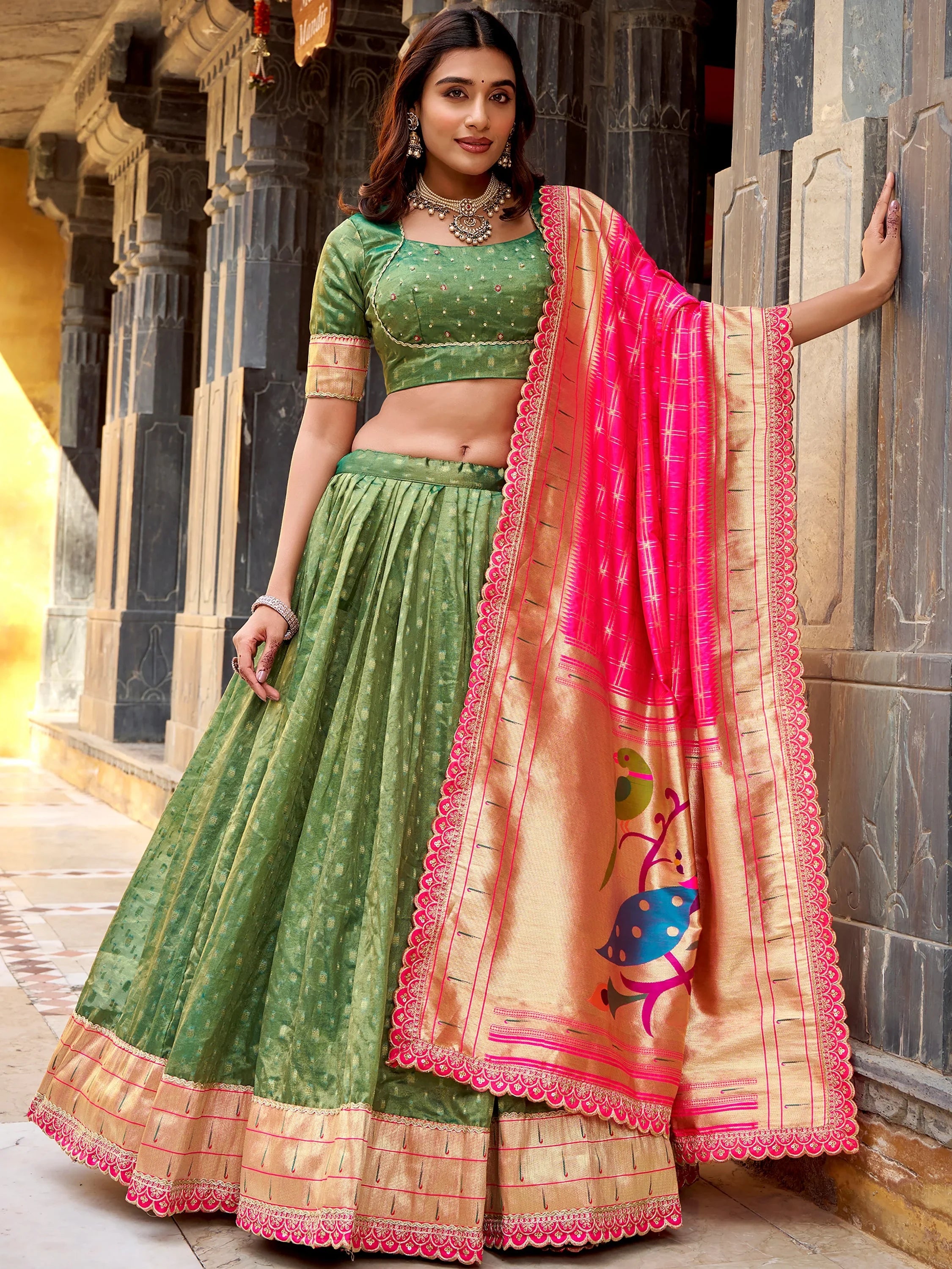 Fabulous Green Zari Weaving Silk Mehendi Wear Lehenga Choli With Dupatta