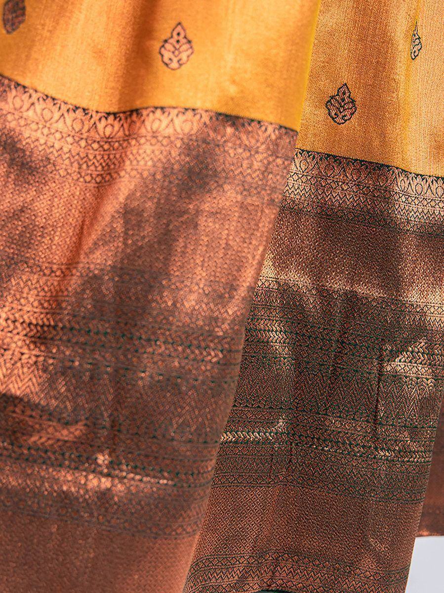 Golden and bronze ethnic saree with intricate woven border and leaf motifs, perfect for festive occasions.