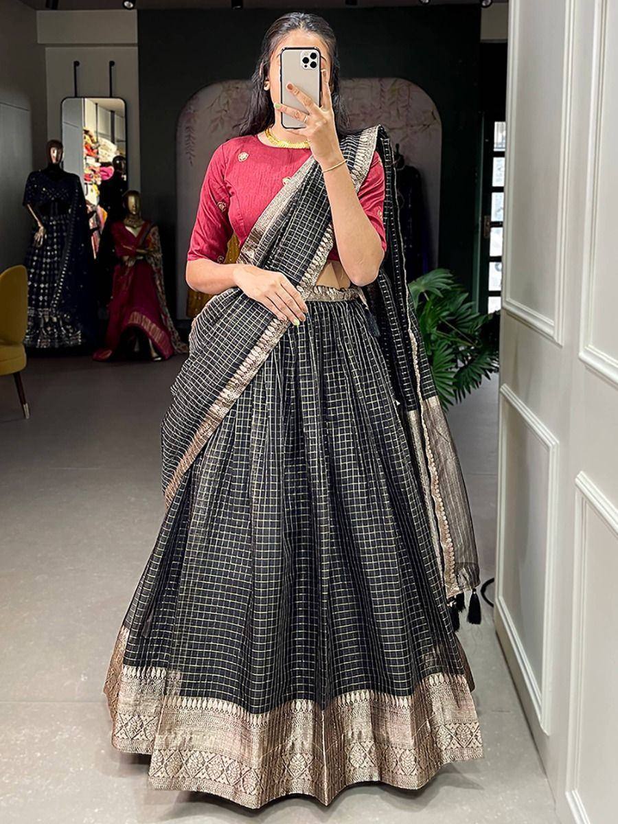 Black and gold checkered lehenga choli with embroidered border, perfect for Indian ethnic wear occasions