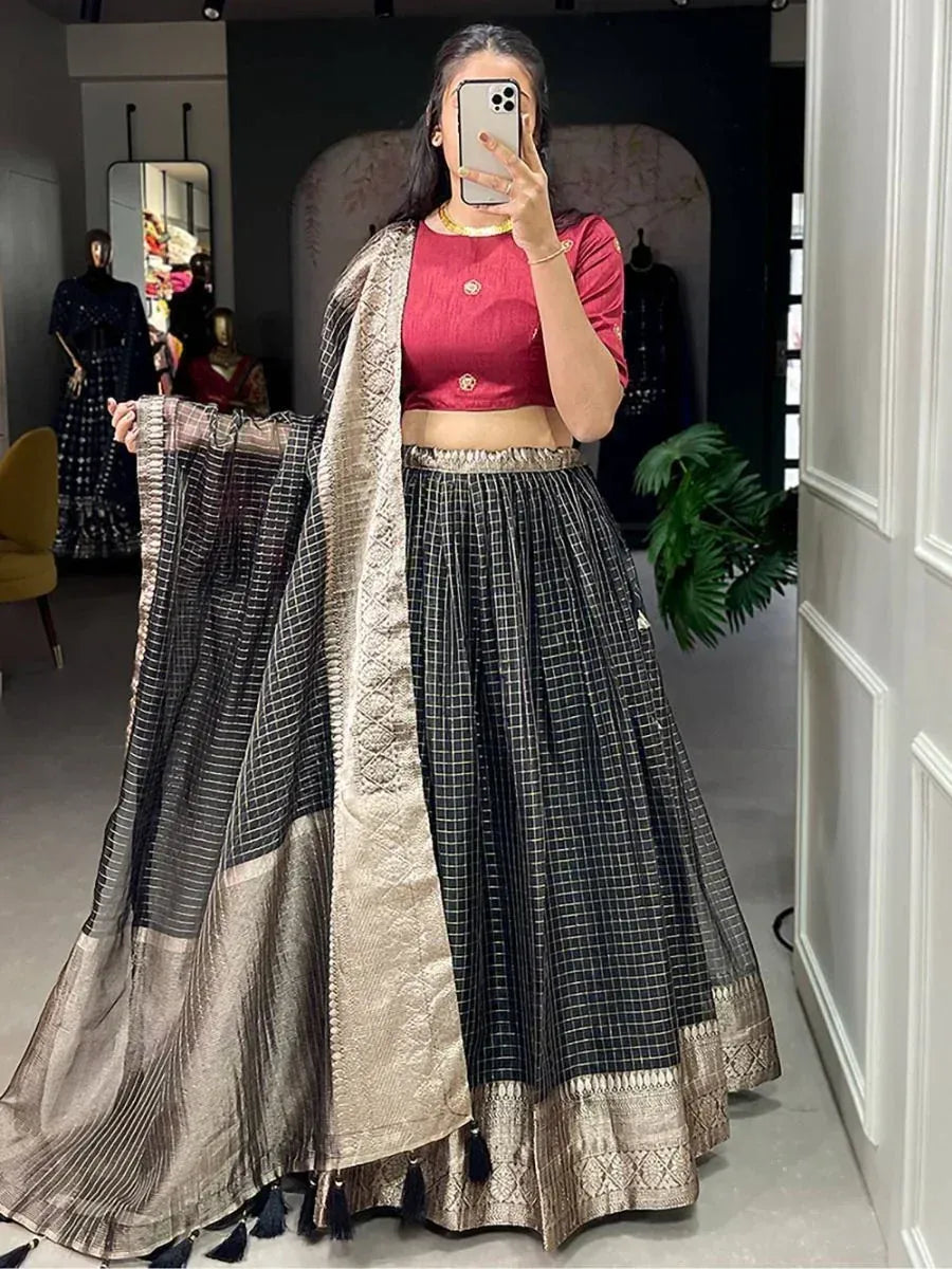 Black and gold checkered lehenga choli with embroidered dupatta, perfect for Indian ethnic wear occasions